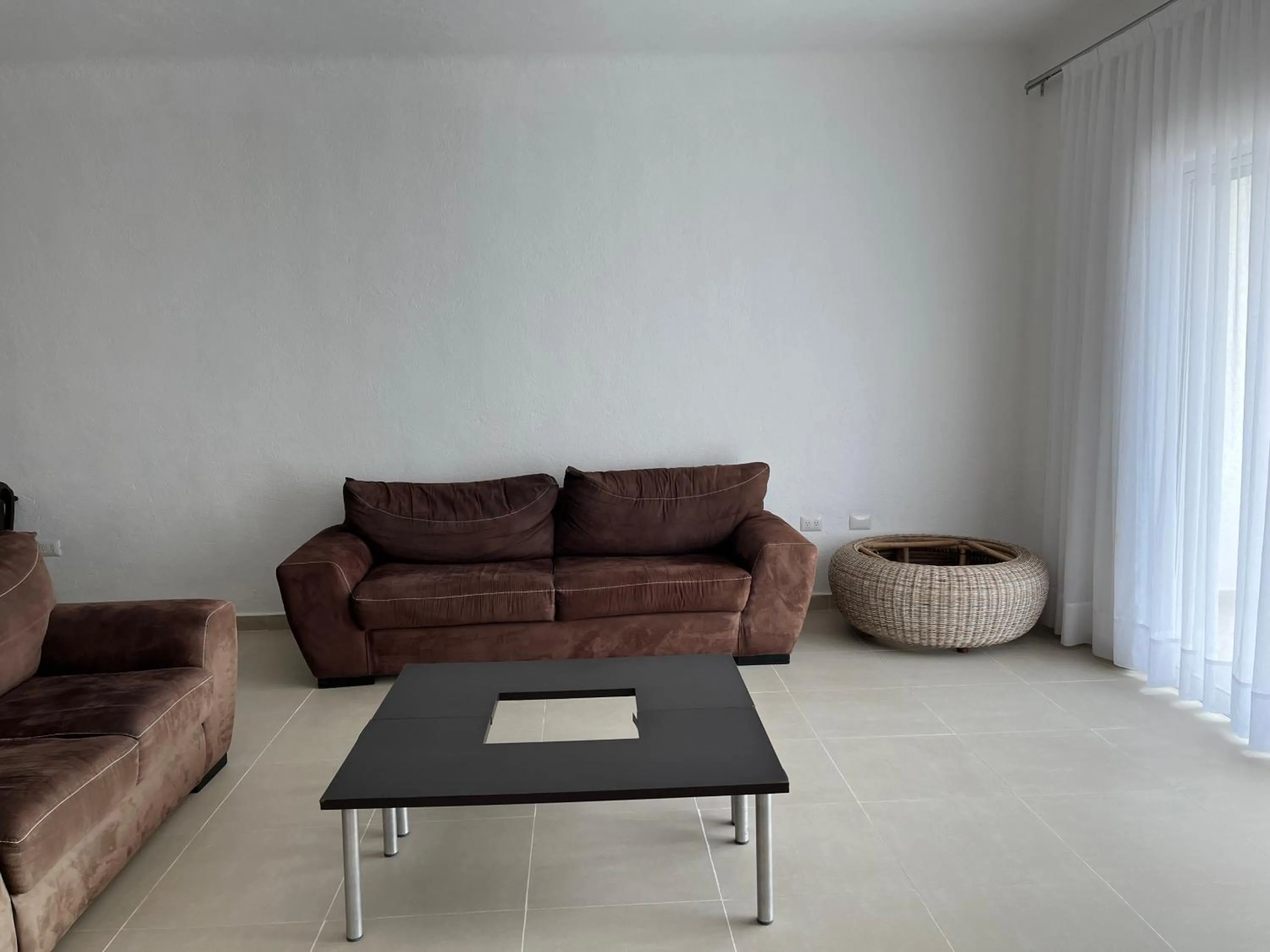 Living room in Thelmar Playa Mamitas Apartment