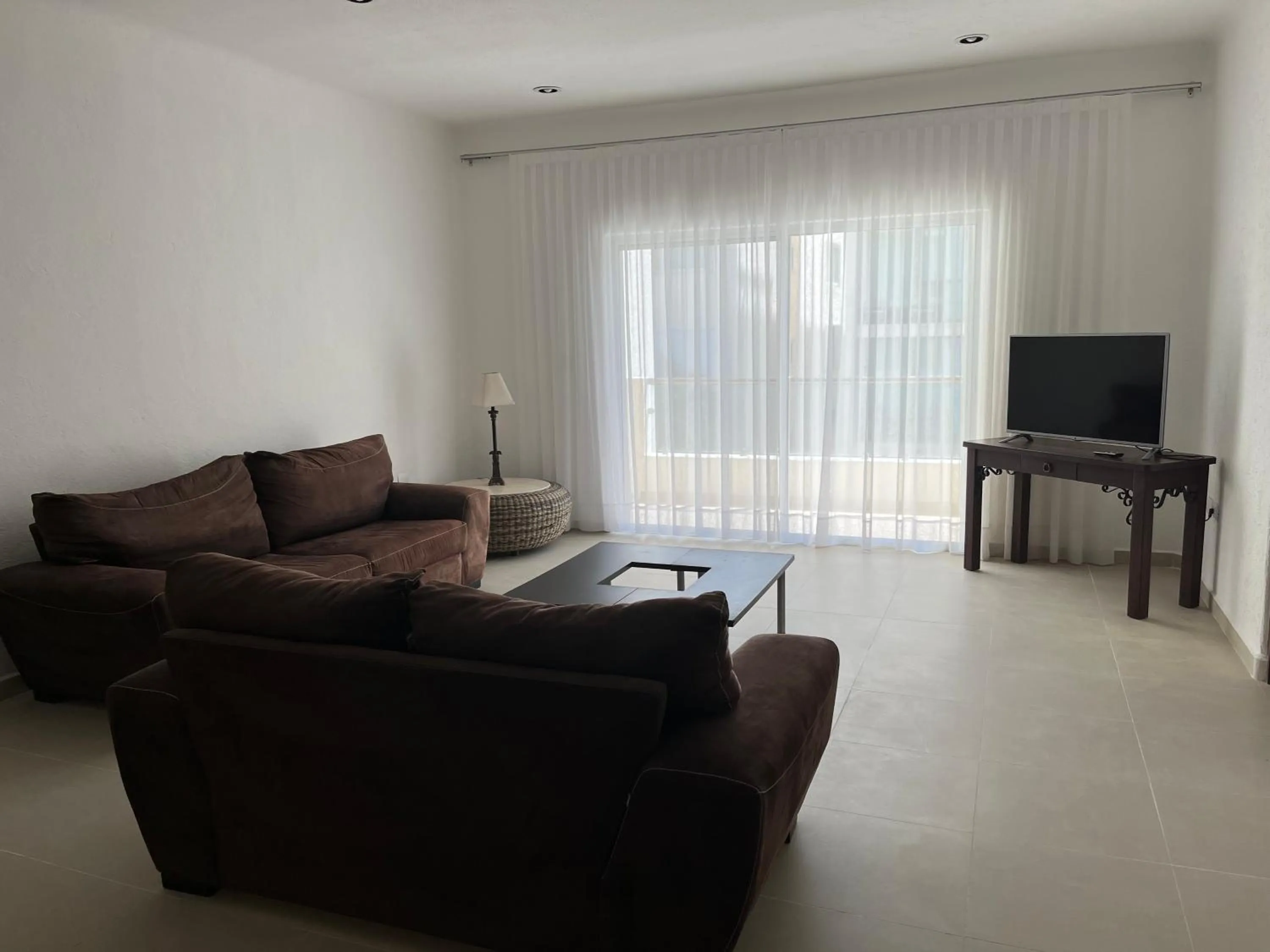 Living room in Thelmar Playa Mamitas Apartment