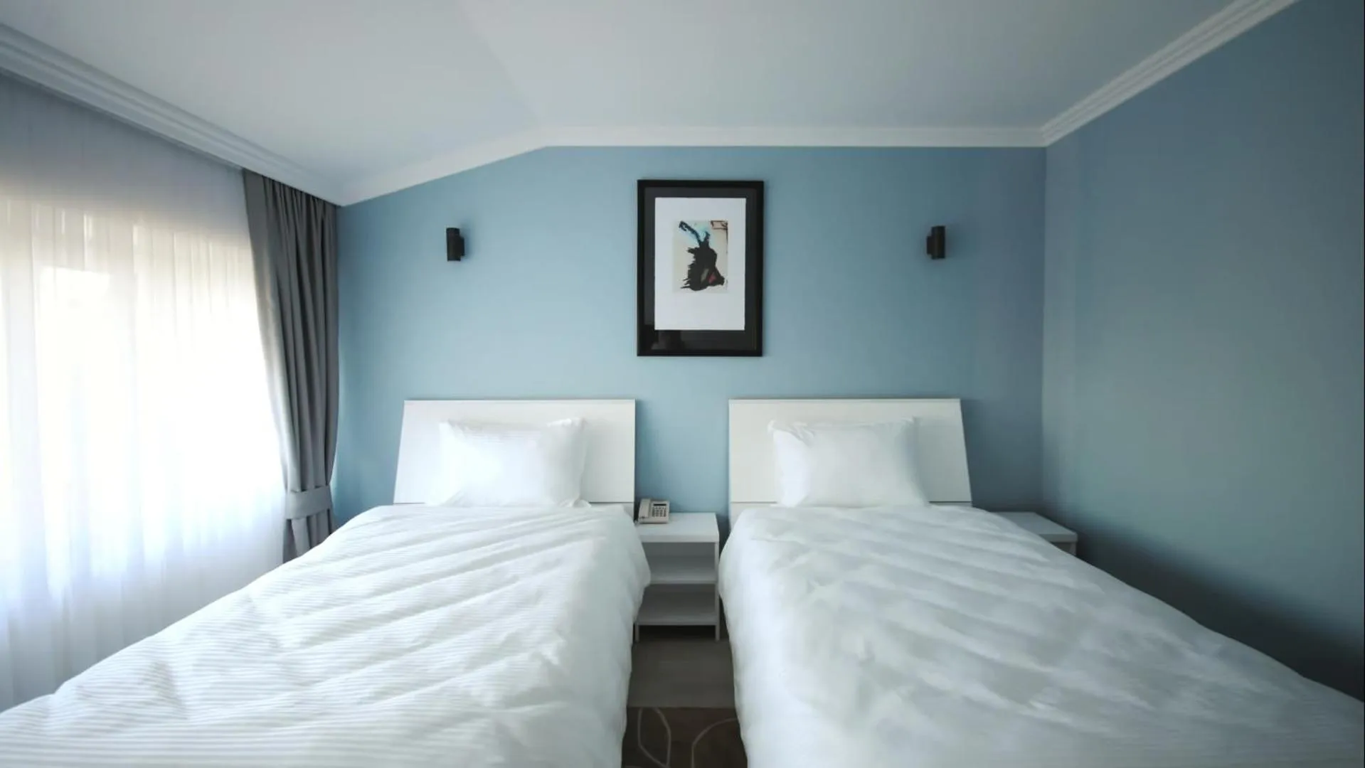 Bed in Hotel Callisto