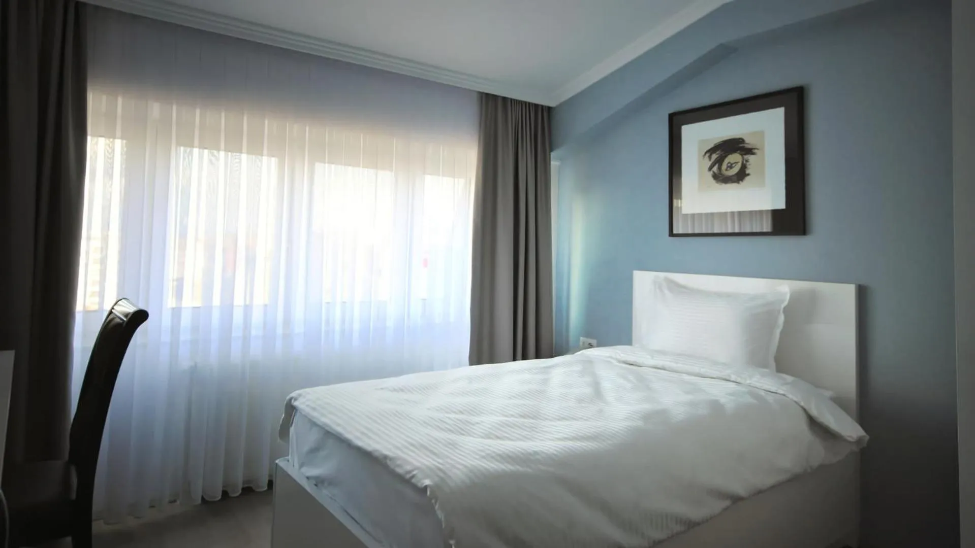 Bed in Hotel Callisto