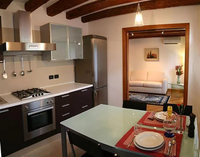 Kitchen or kitchenette in Salmaso Apartments