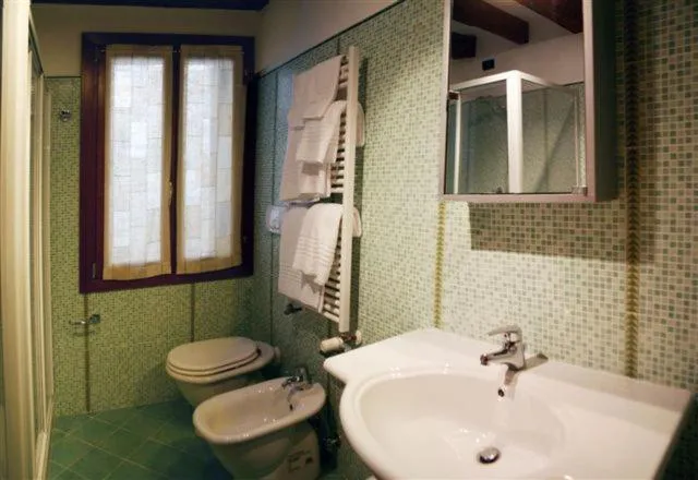 Toilet in Salmaso Apartments