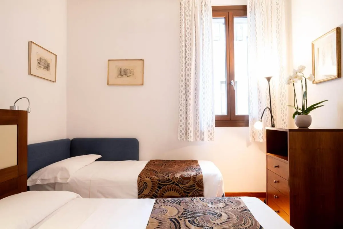 Bed in Salmaso Apartments
