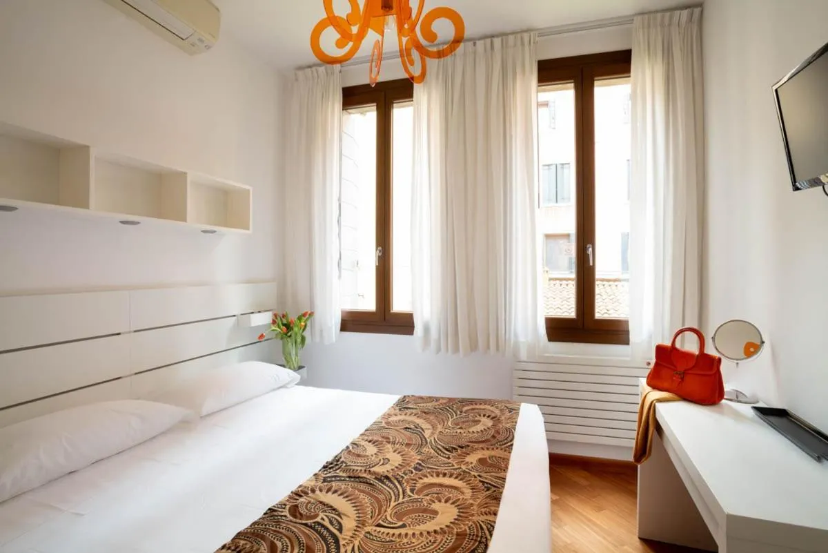 Bed in Salmaso Apartments