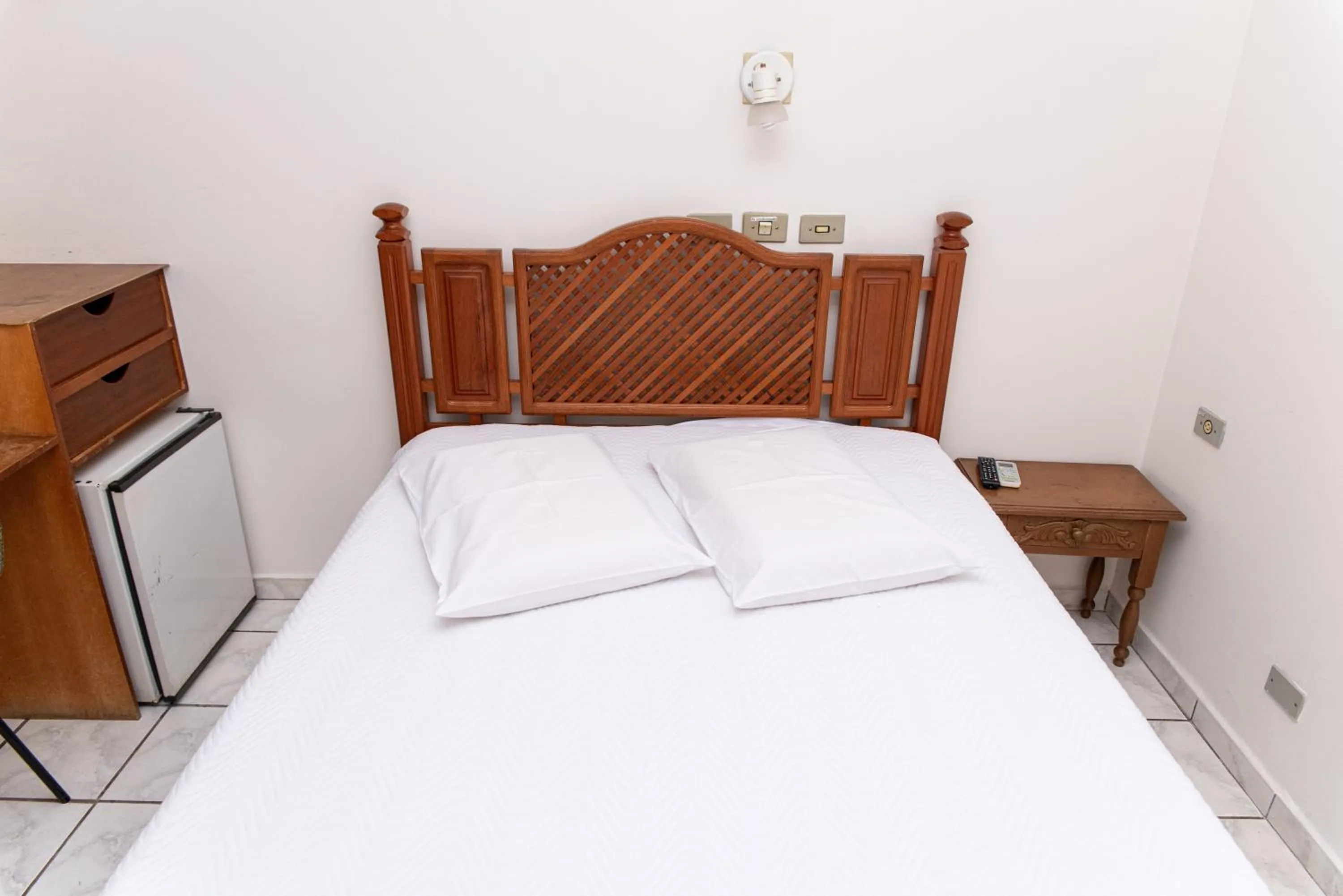 Bed in Hotel Descalvado