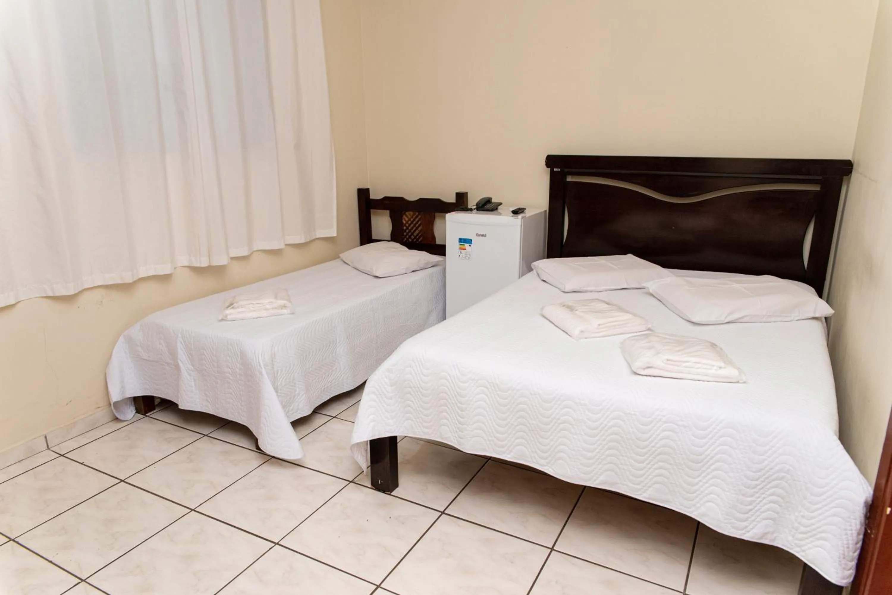 Bed in Hotel Descalvado