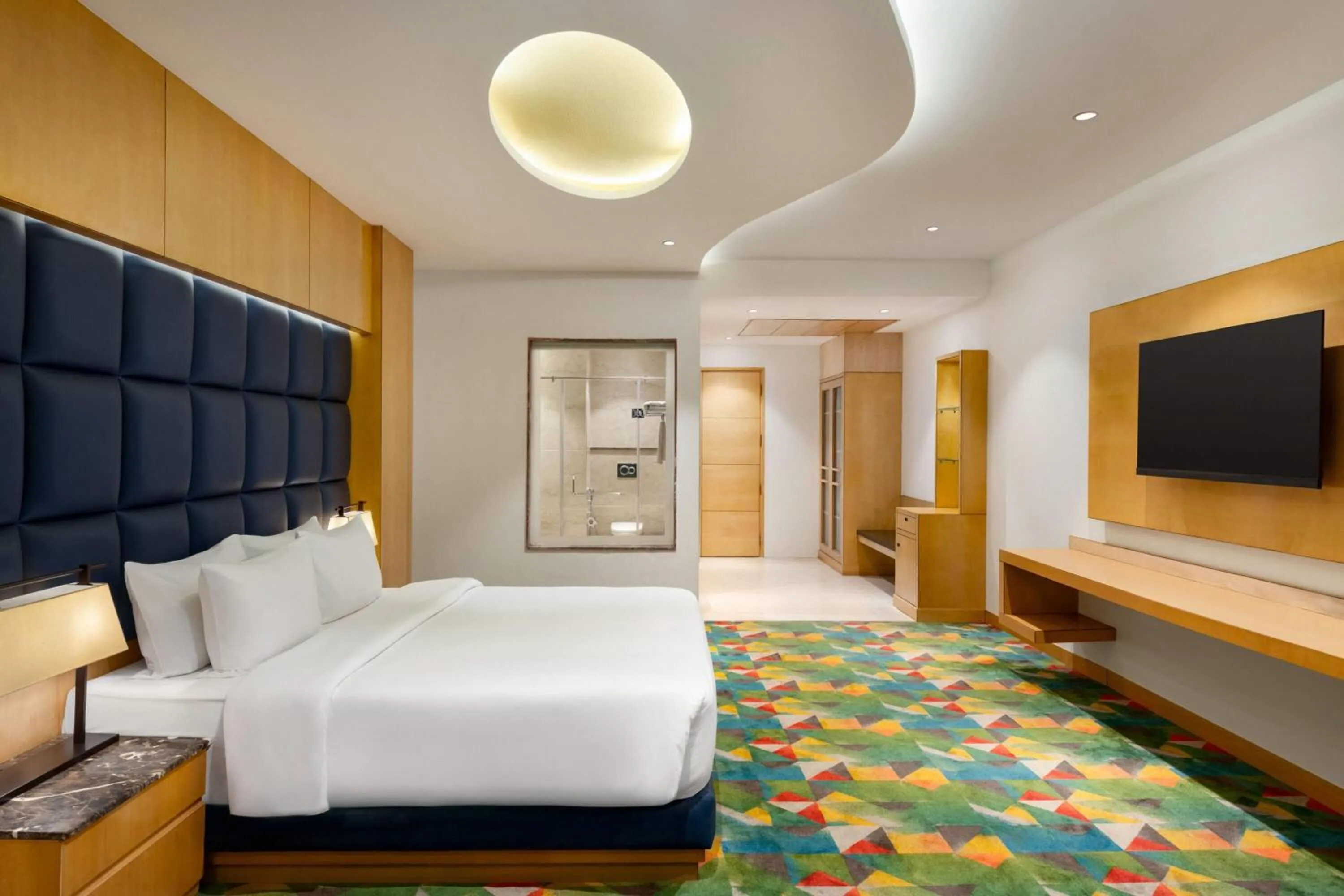 Photo of the whole room, Bed in Ramada Plaza by Wyndham Jammu Vijaypur