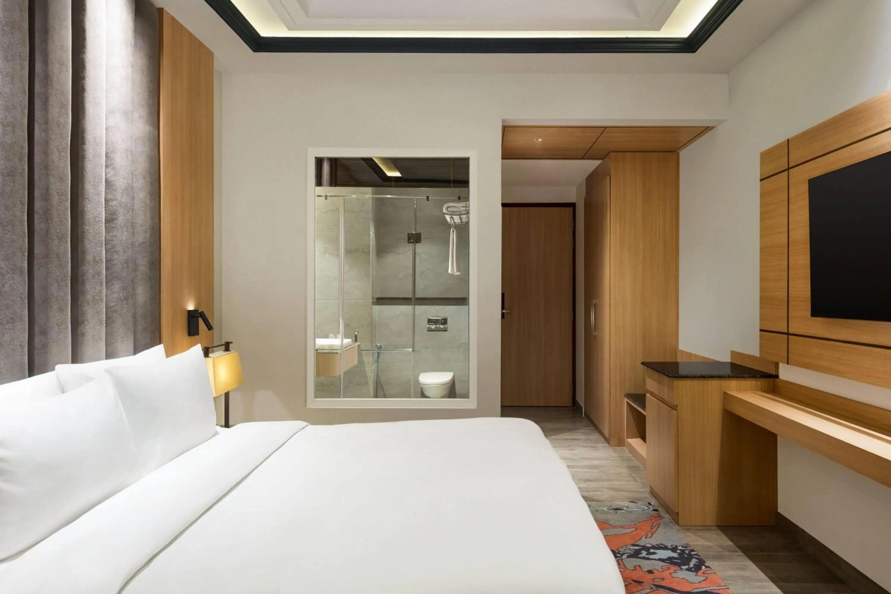 Photo of the whole room, Bed in Ramada Plaza by Wyndham Jammu Vijaypur