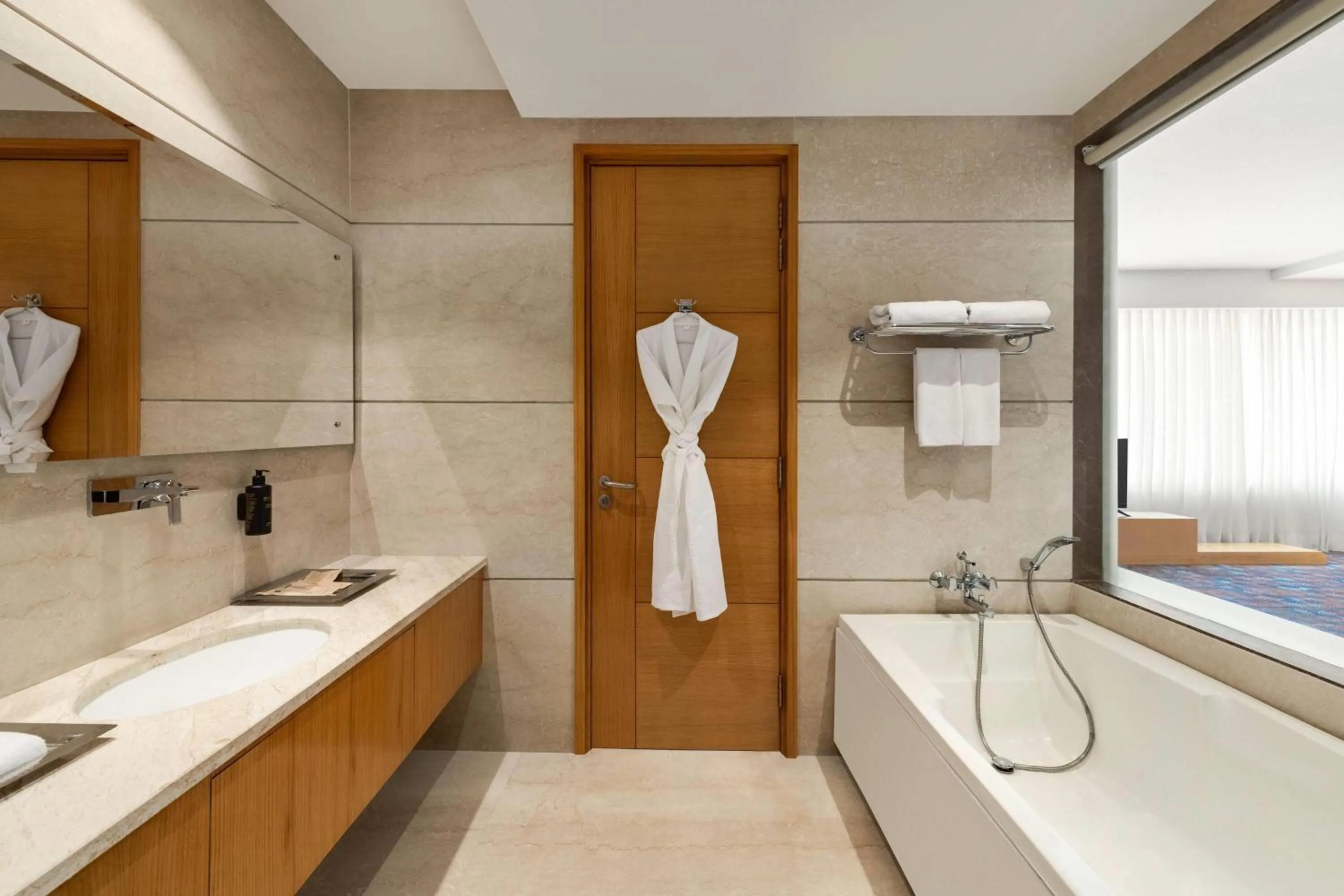 Bathroom in Ramada Plaza by Wyndham Jammu Vijaypur
