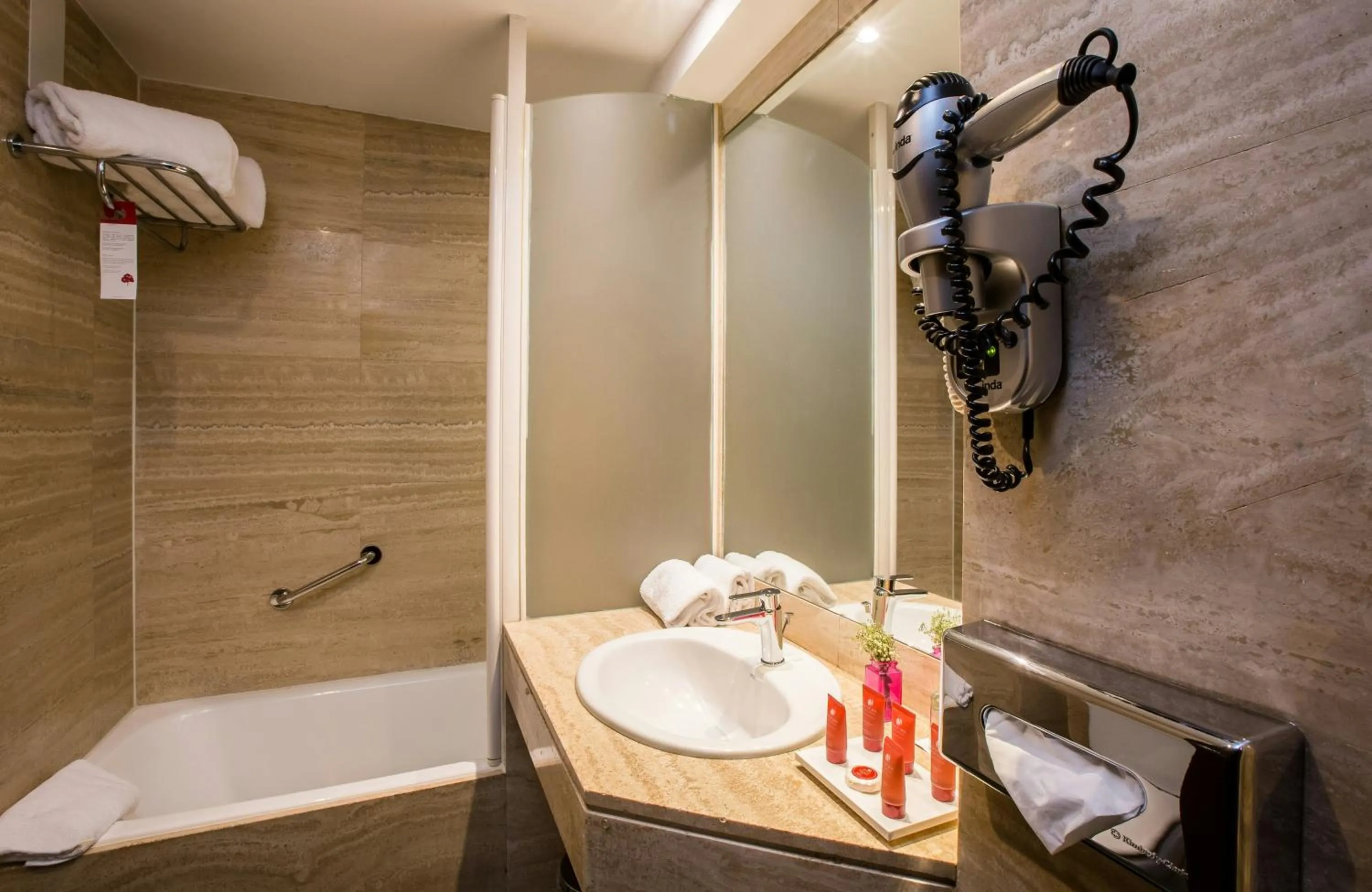 Bathroom in Leonardo Hotel Madrid City Center