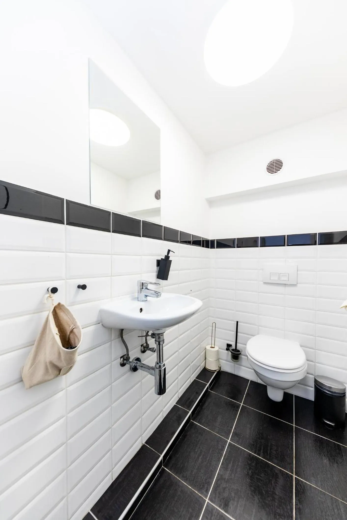 Toilet in Adagio Downtown Rooms