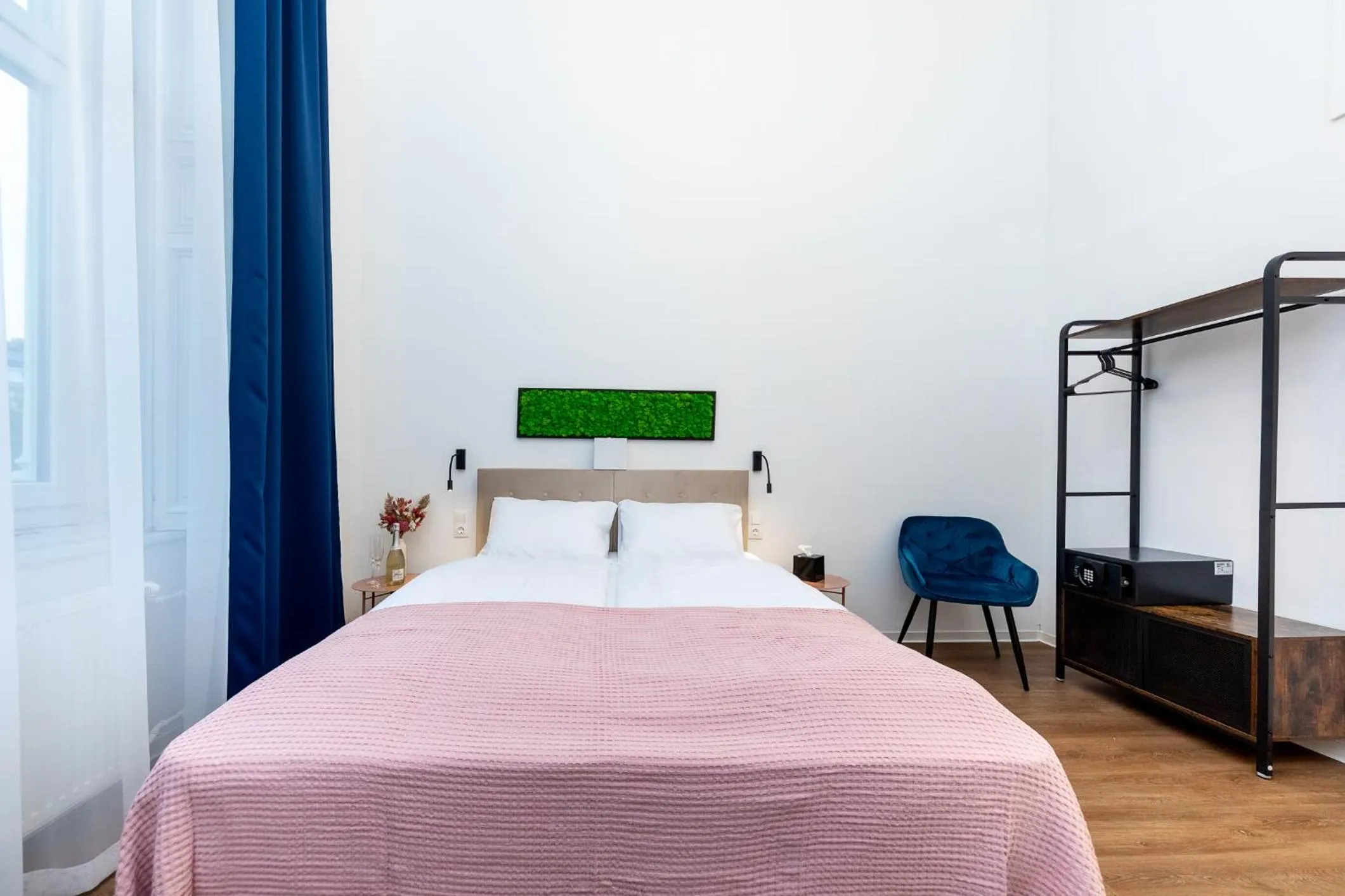 Bed in Adagio Downtown Rooms