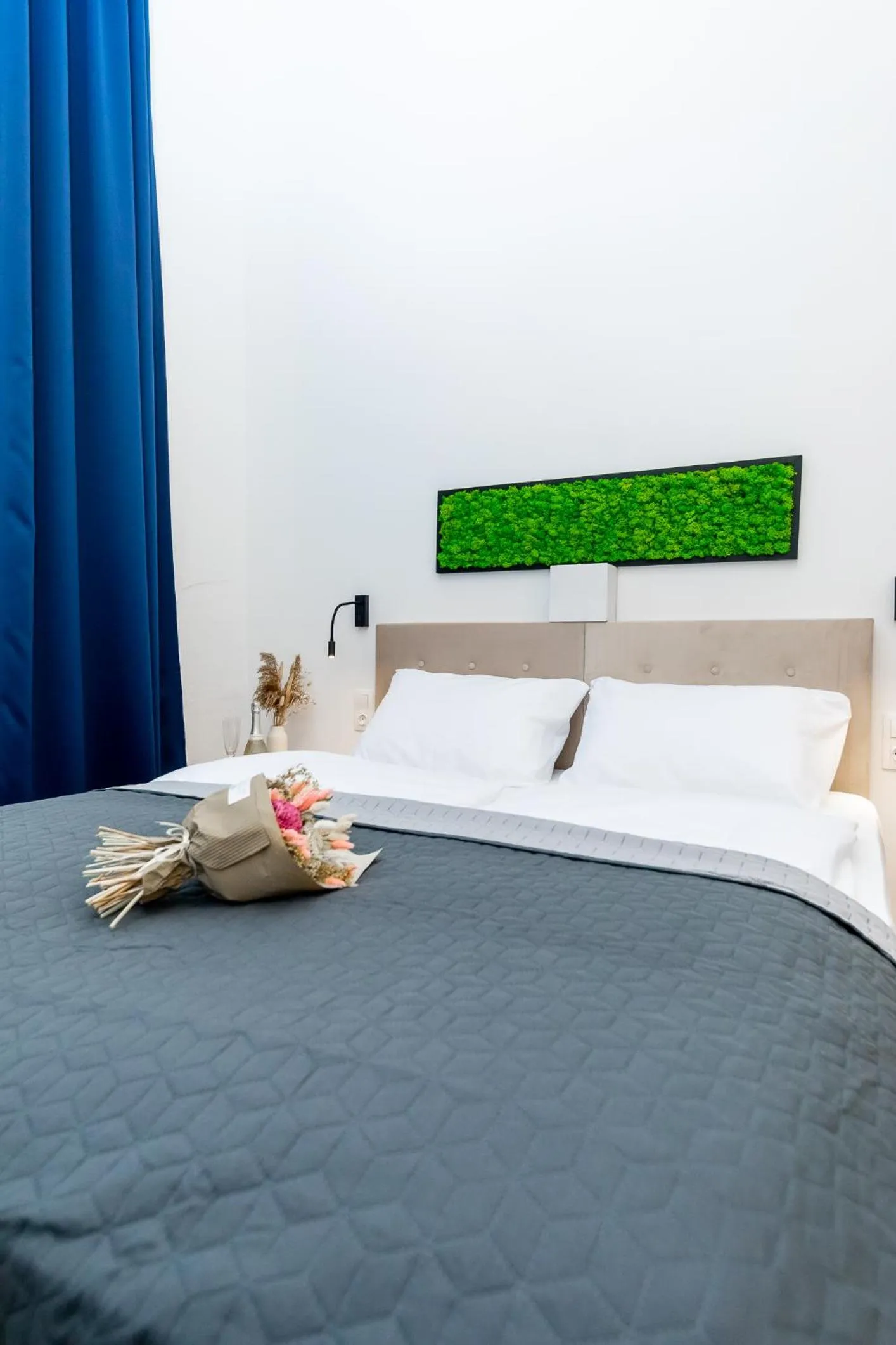 Bed in Adagio Downtown Rooms