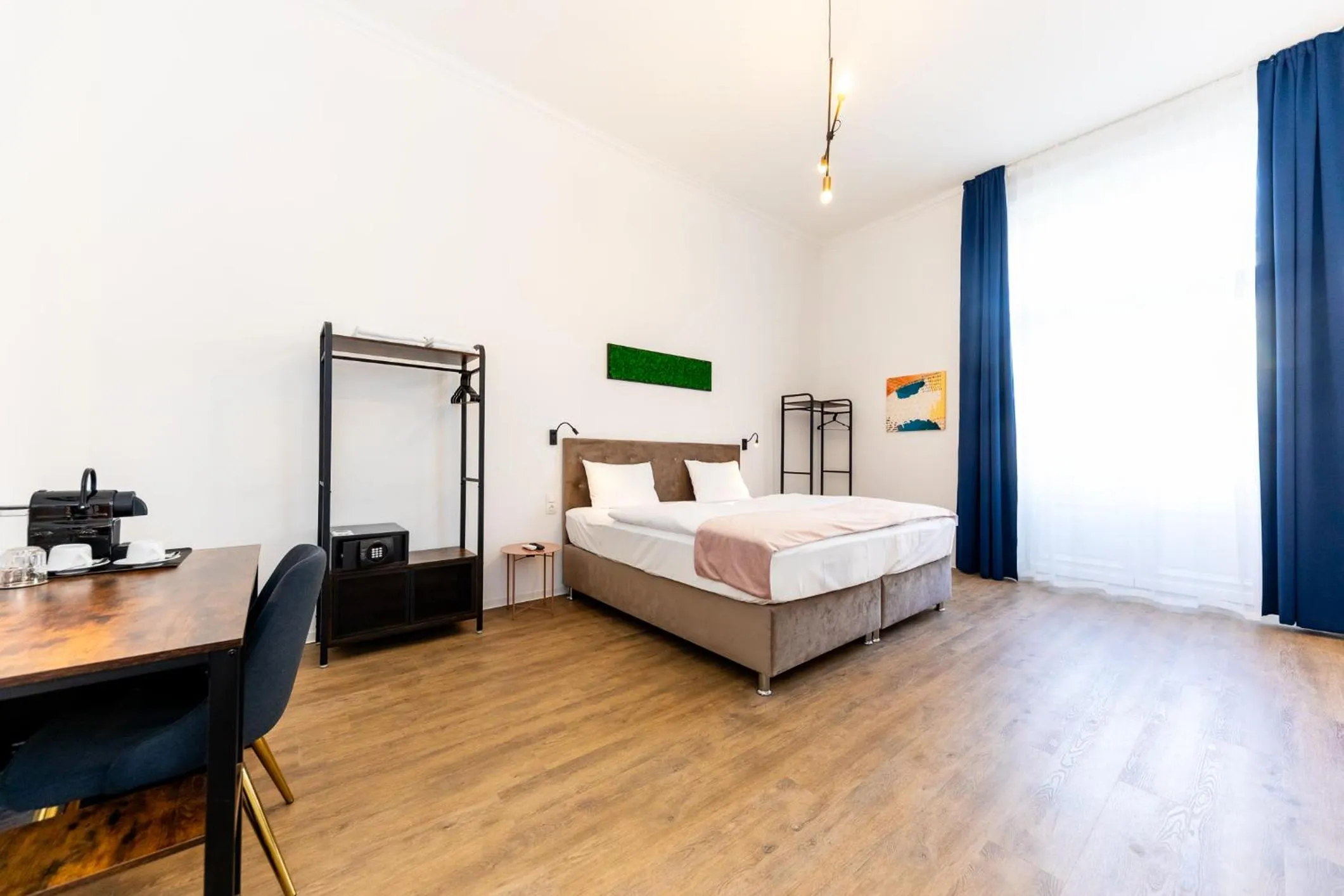 Bed in Adagio Downtown Rooms