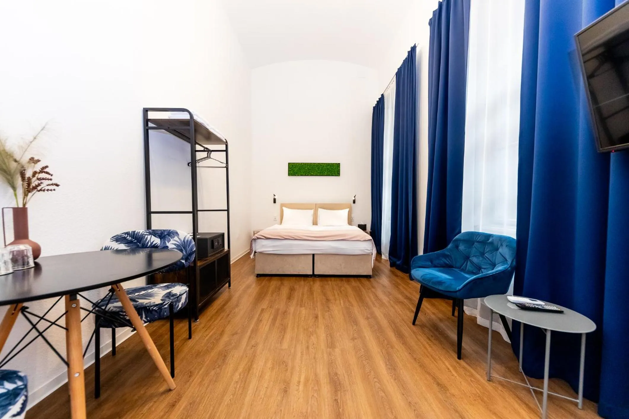 Bed in Adagio Downtown Rooms