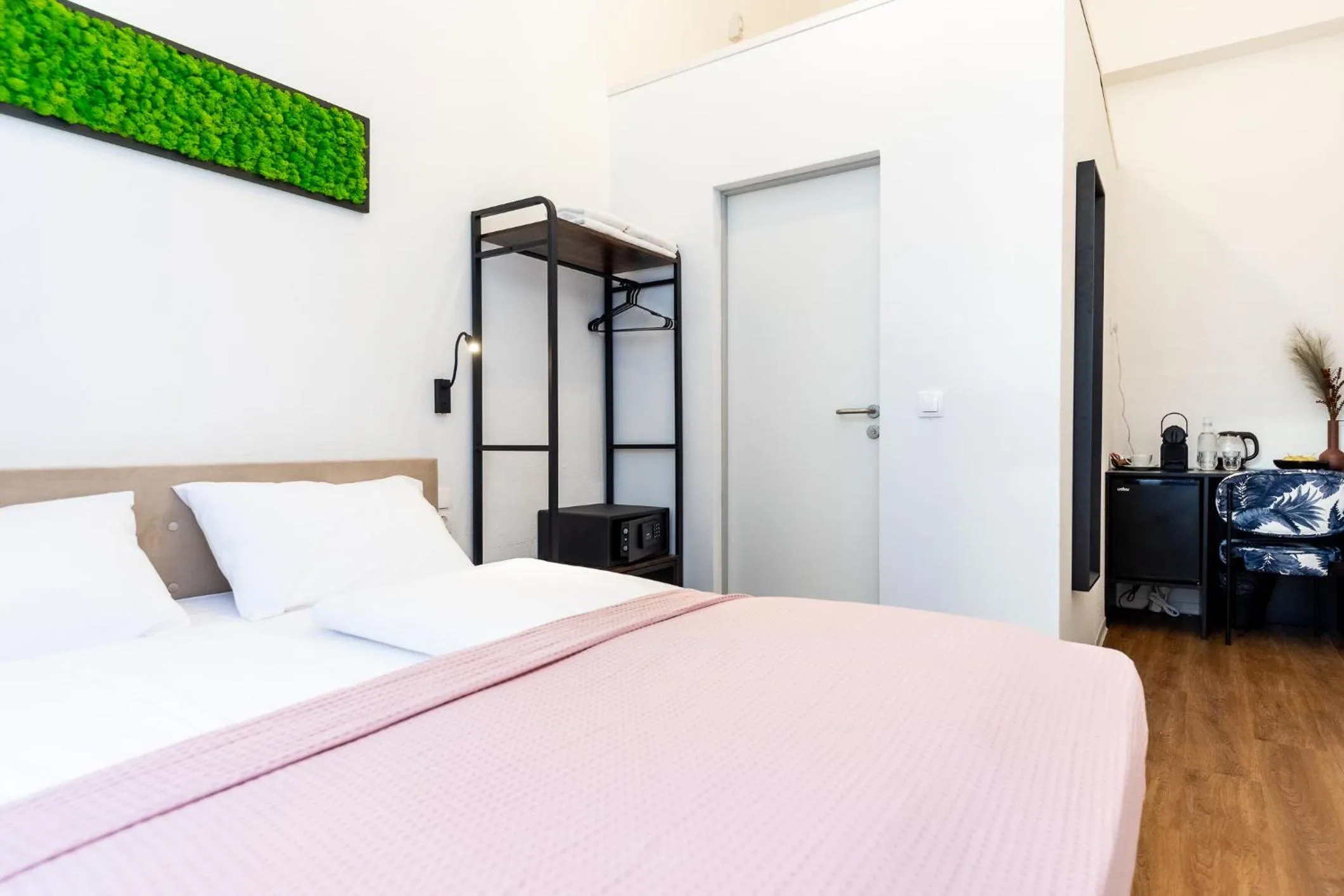 Bed in Adagio Downtown Rooms