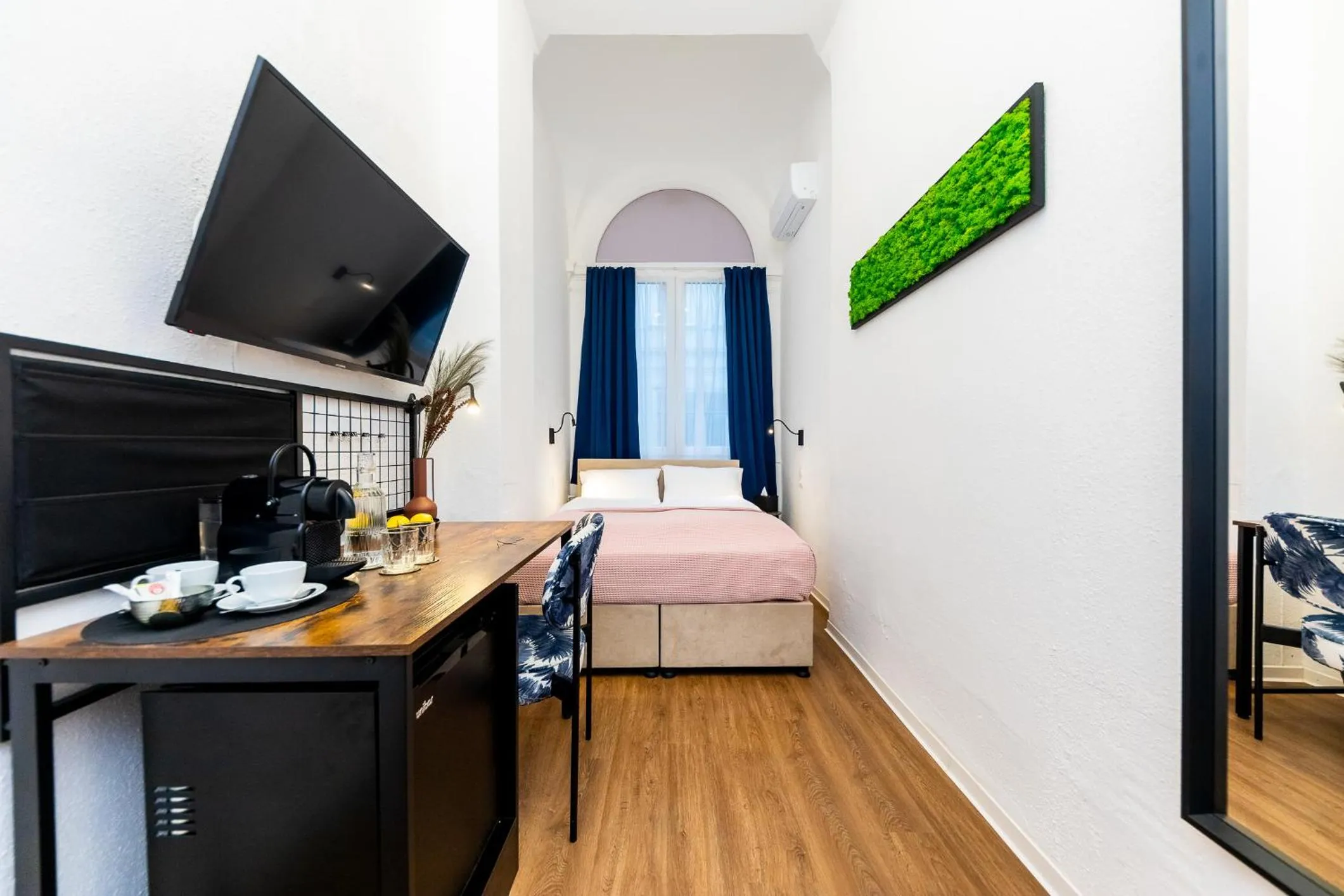 Bed in Adagio Downtown Rooms