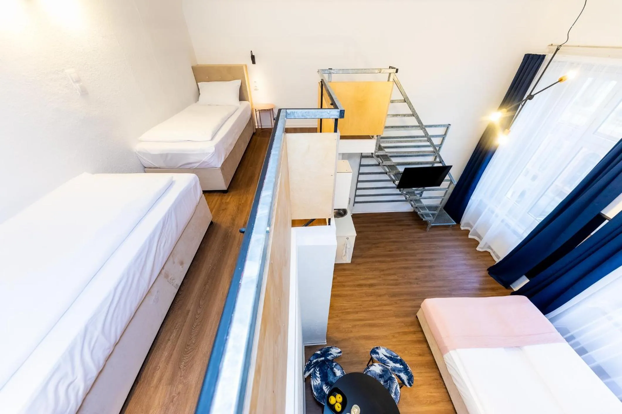 Bed in Adagio Downtown Rooms