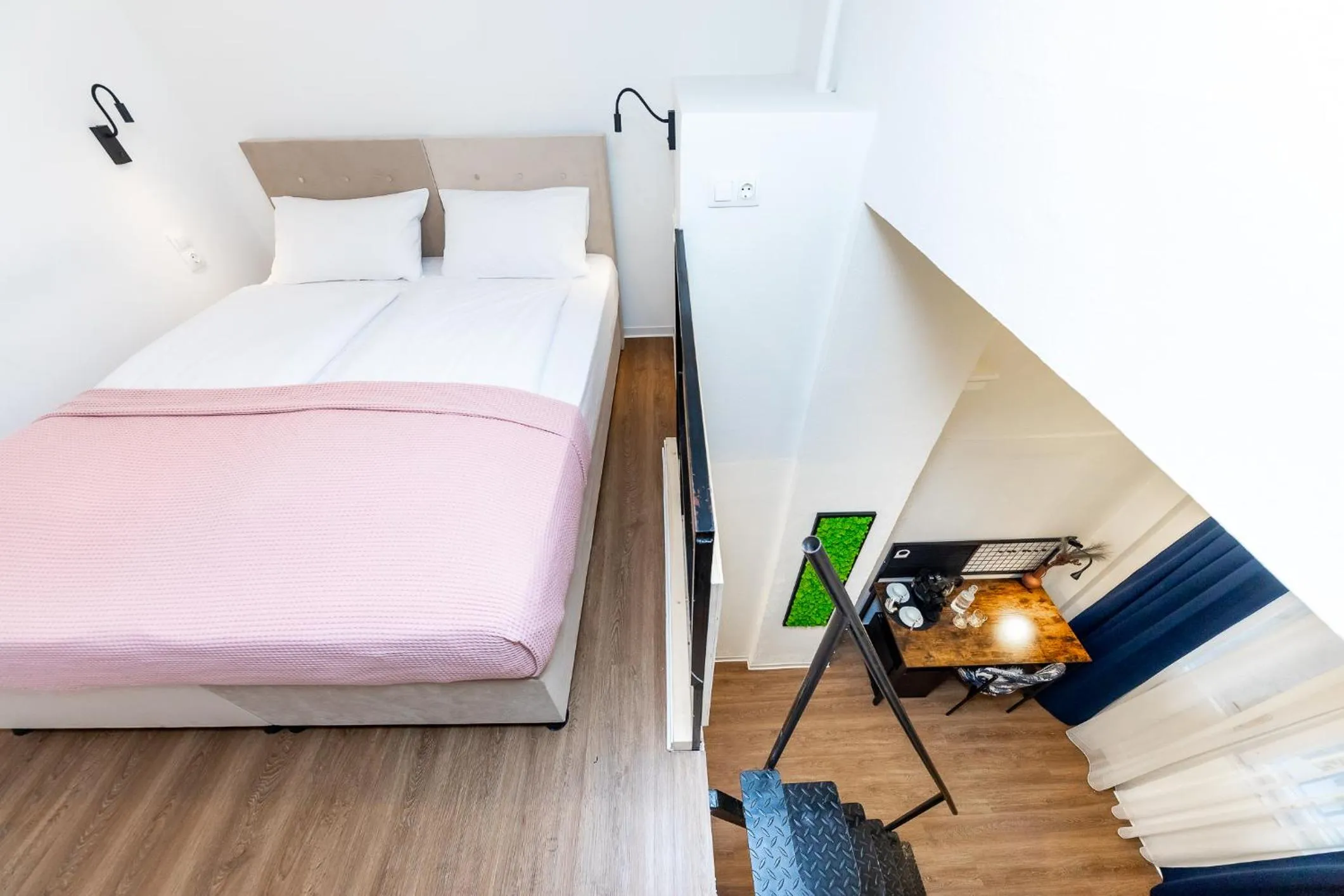 Bed in Adagio Downtown Rooms