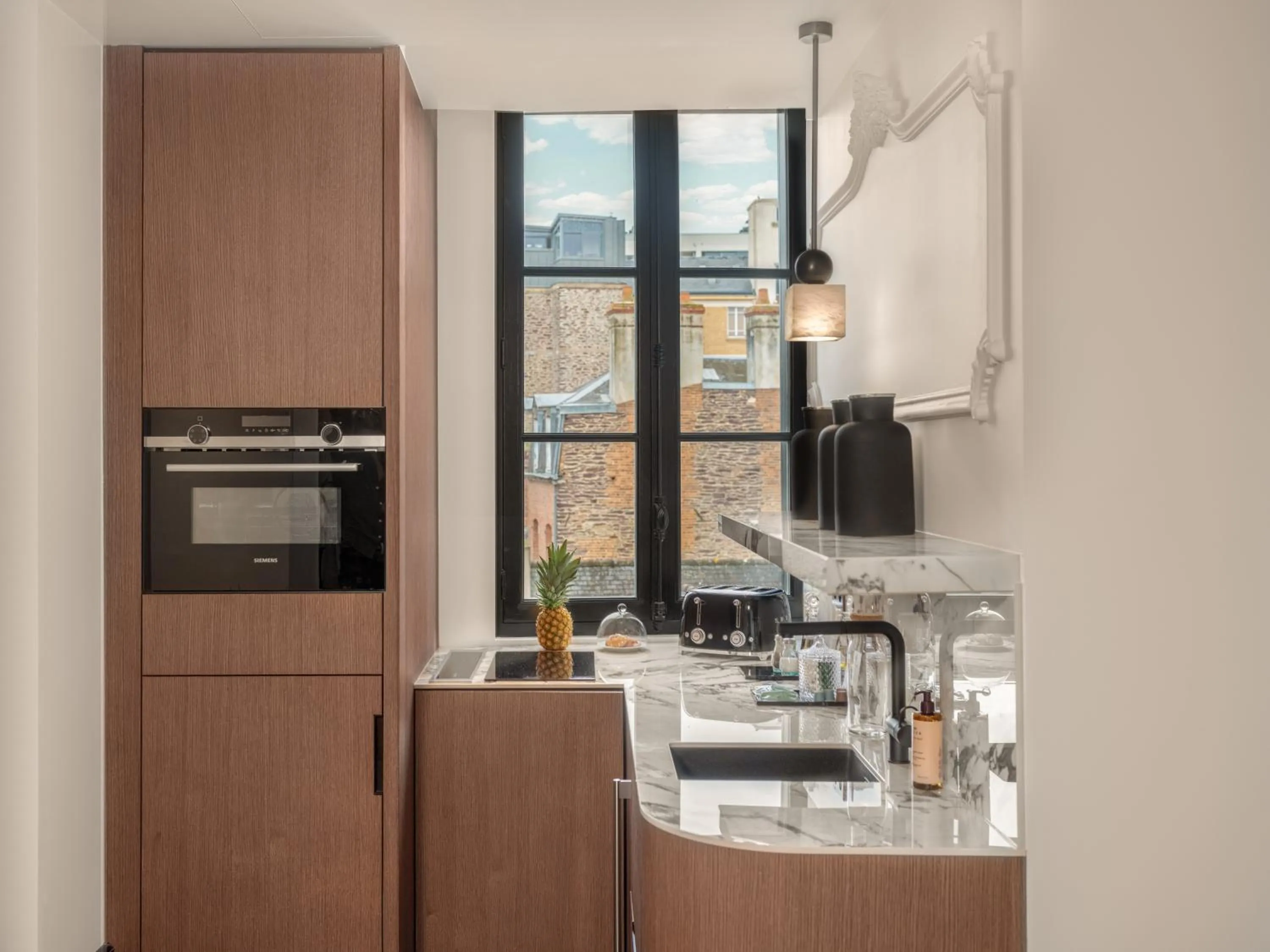 Kitchen or kitchenette in Balthazar Hotel & Spa Rennes - MGallery Collection