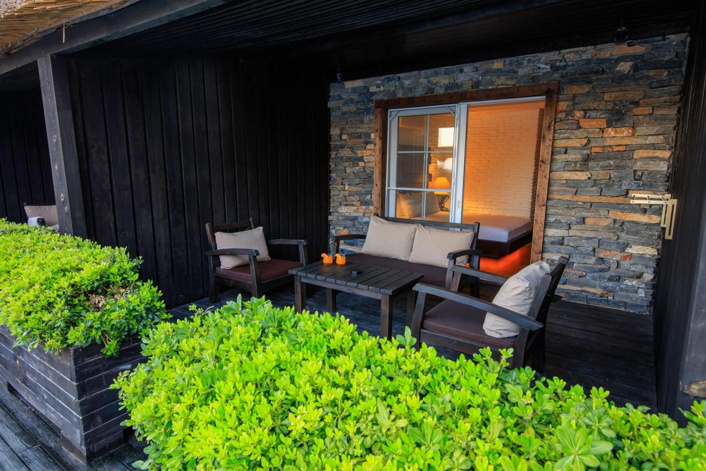 Seating area in Manaspark Deluxe Hotel