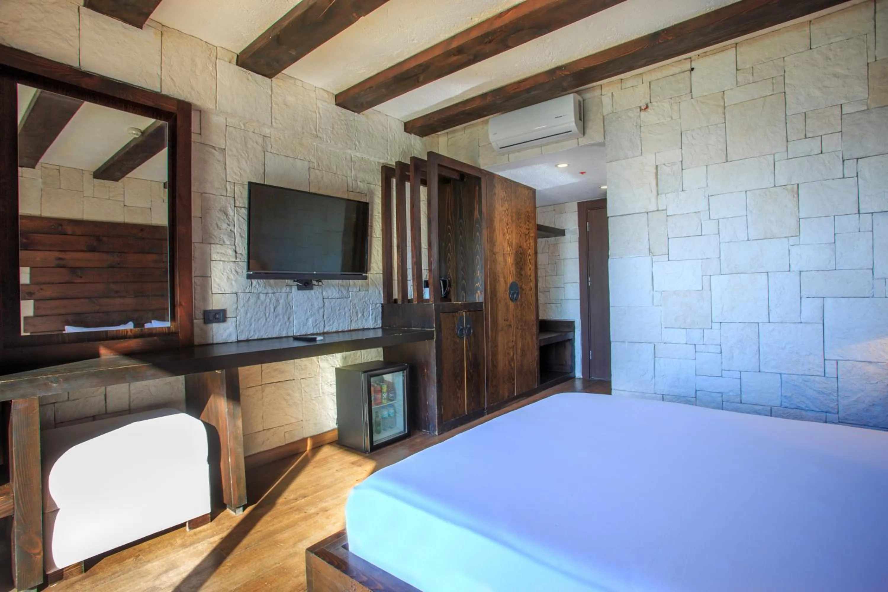 furniture, Bed in Manaspark Deluxe Hotel