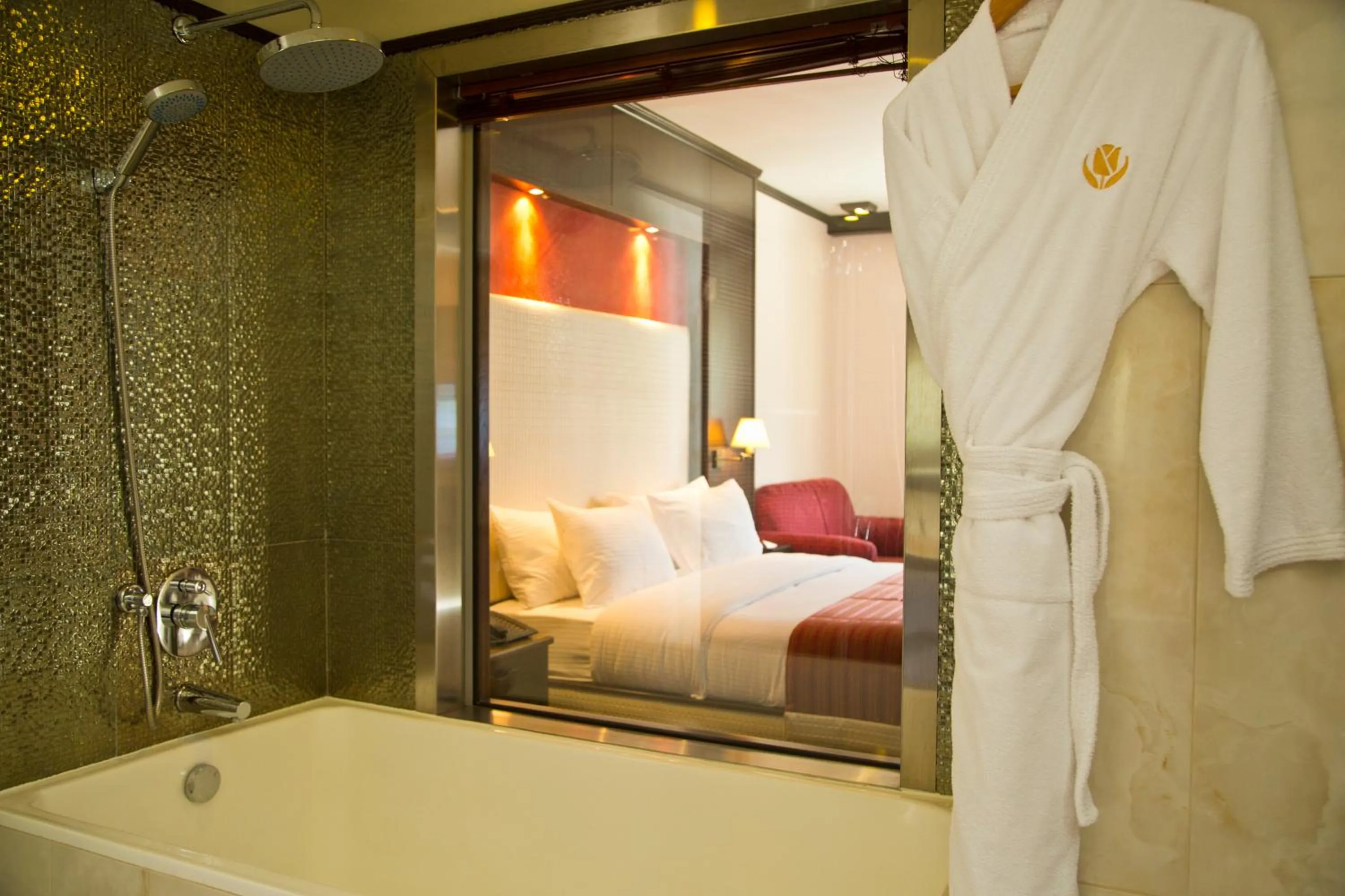 Shower, Bed in Golden Lili Resort & Spa
