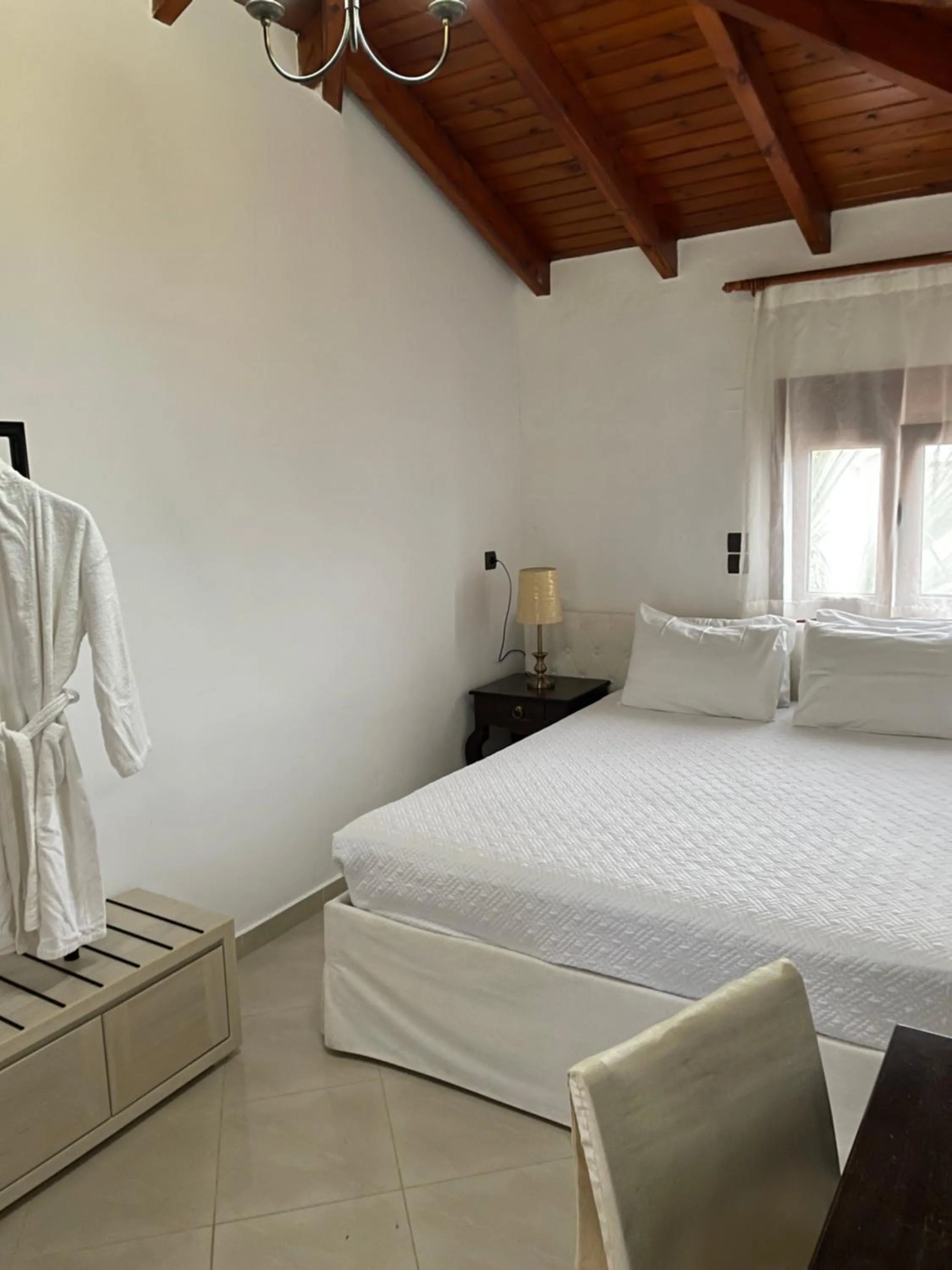 Bedroom, Bed in Eva & Dimitrios Villas, Captivating Oasis with Pools & BBQ, By ThinkVilla