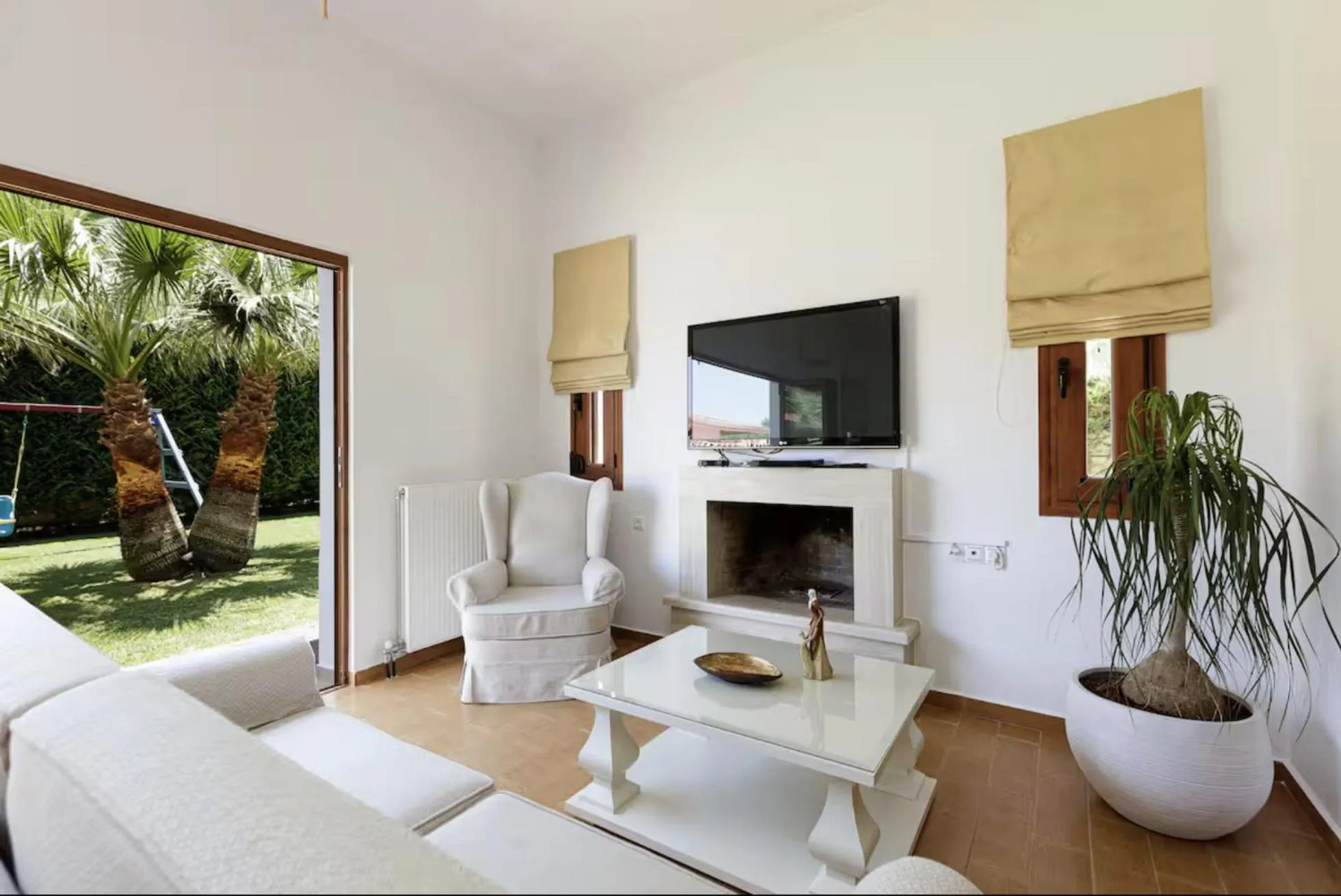 Living room in Eva & Dimitrios Villas, Captivating Oasis with Pools & BBQ, By ThinkVilla