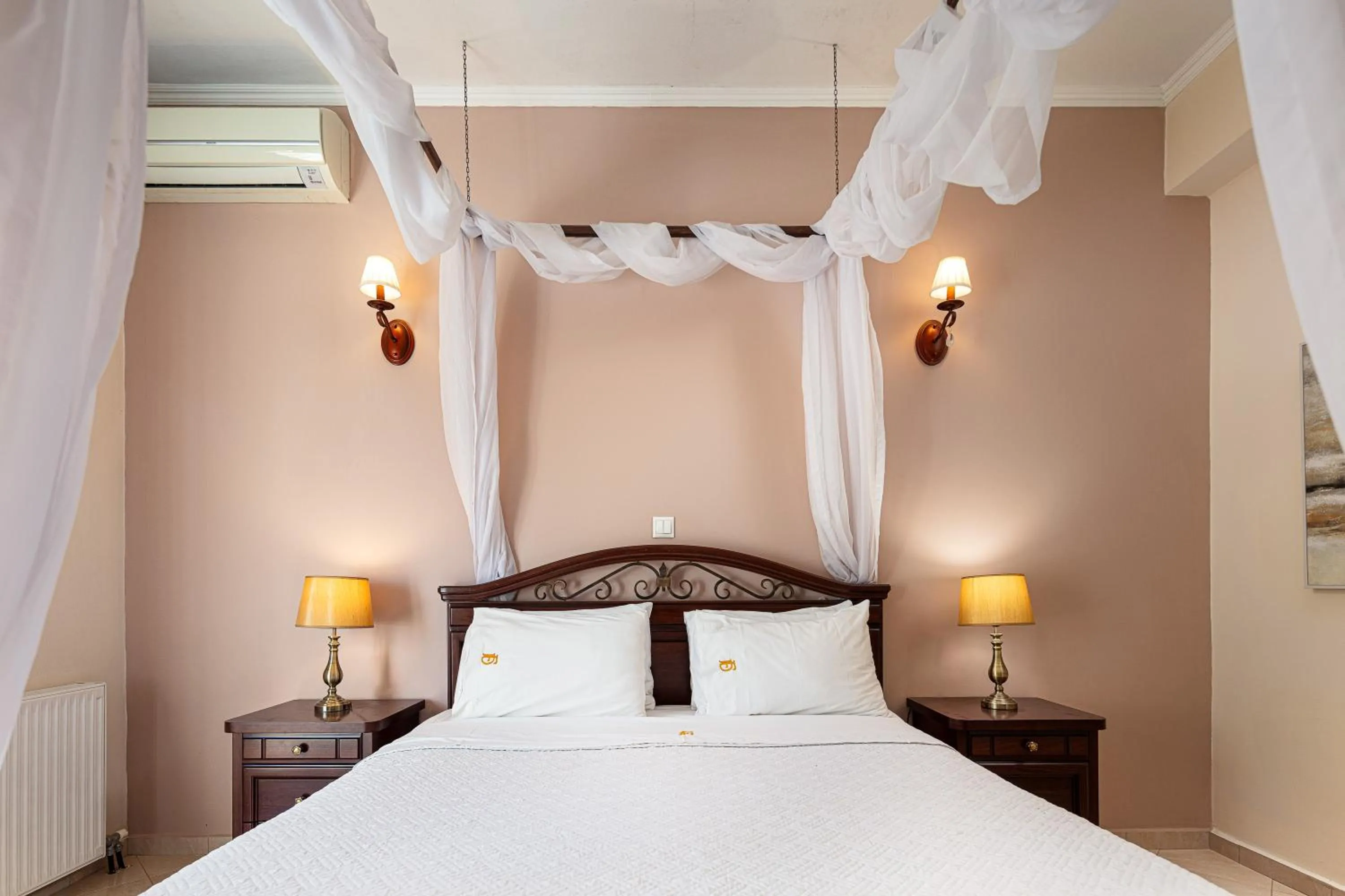 Bed in Eva & Dimitrios Villas, Captivating Oasis with Pools & BBQ, By ThinkVilla