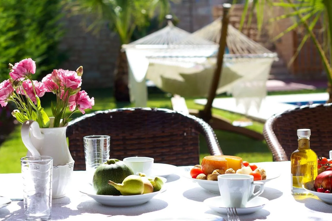 Property building in Eva & Dimitrios Villas, Captivating Oasis with Pools & BBQ, By ThinkVilla