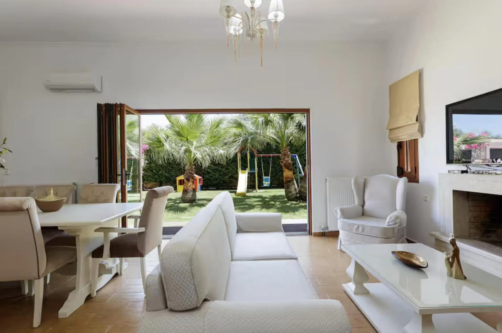 Living room in Eva & Dimitrios Villas, Captivating Oasis with Pools & BBQ, By ThinkVilla