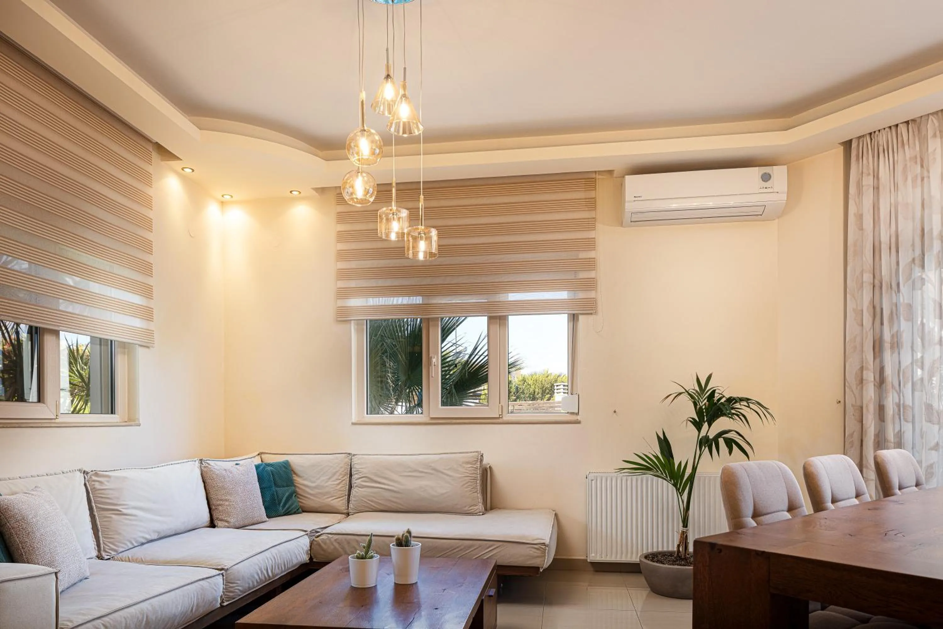Living room in Eva & Dimitrios Villas, Captivating Oasis with Pools & BBQ, By ThinkVilla