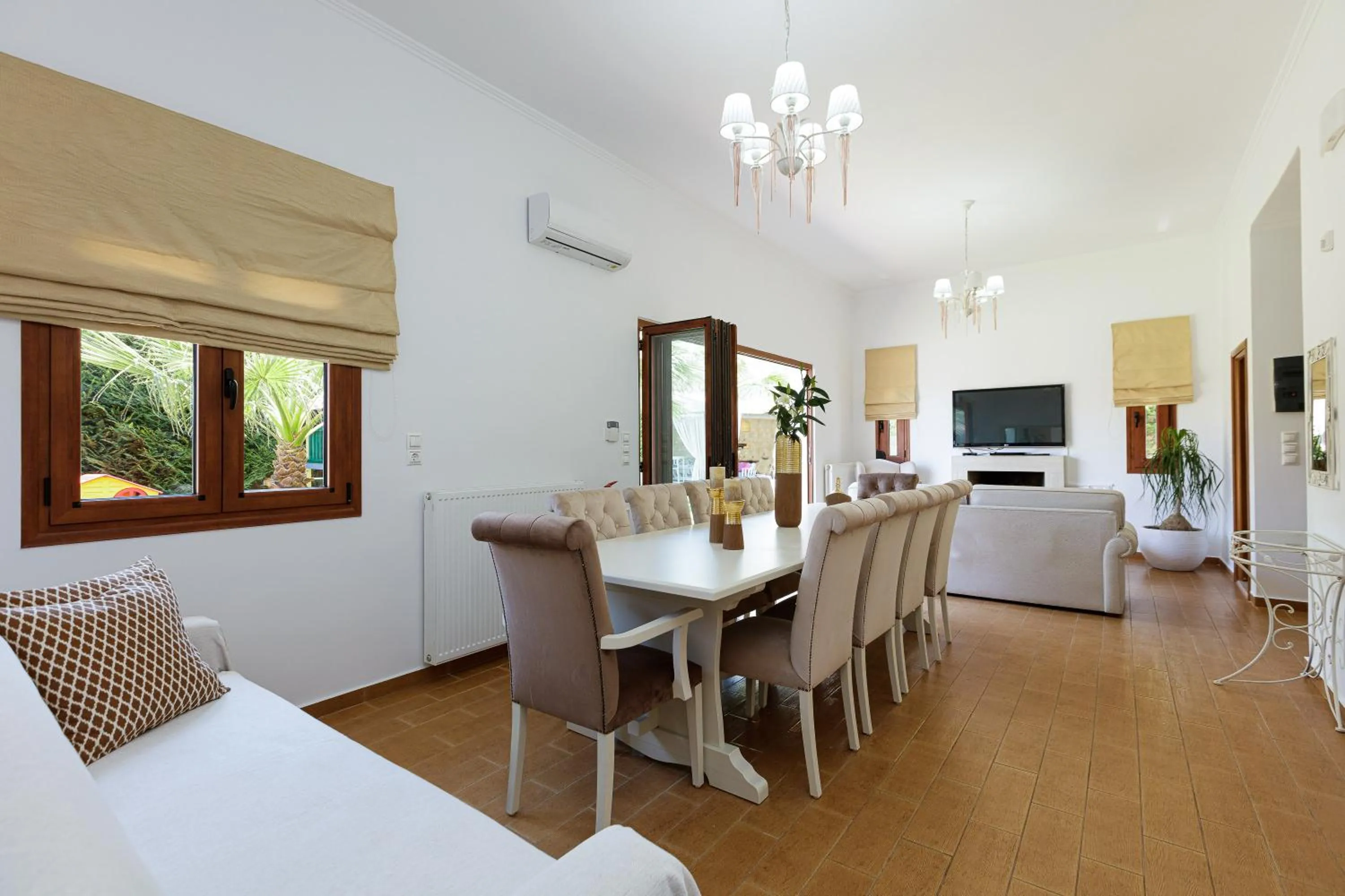 TV and multimedia in Eva & Dimitrios Villas, Captivating Oasis with Pools & BBQ, By ThinkVilla