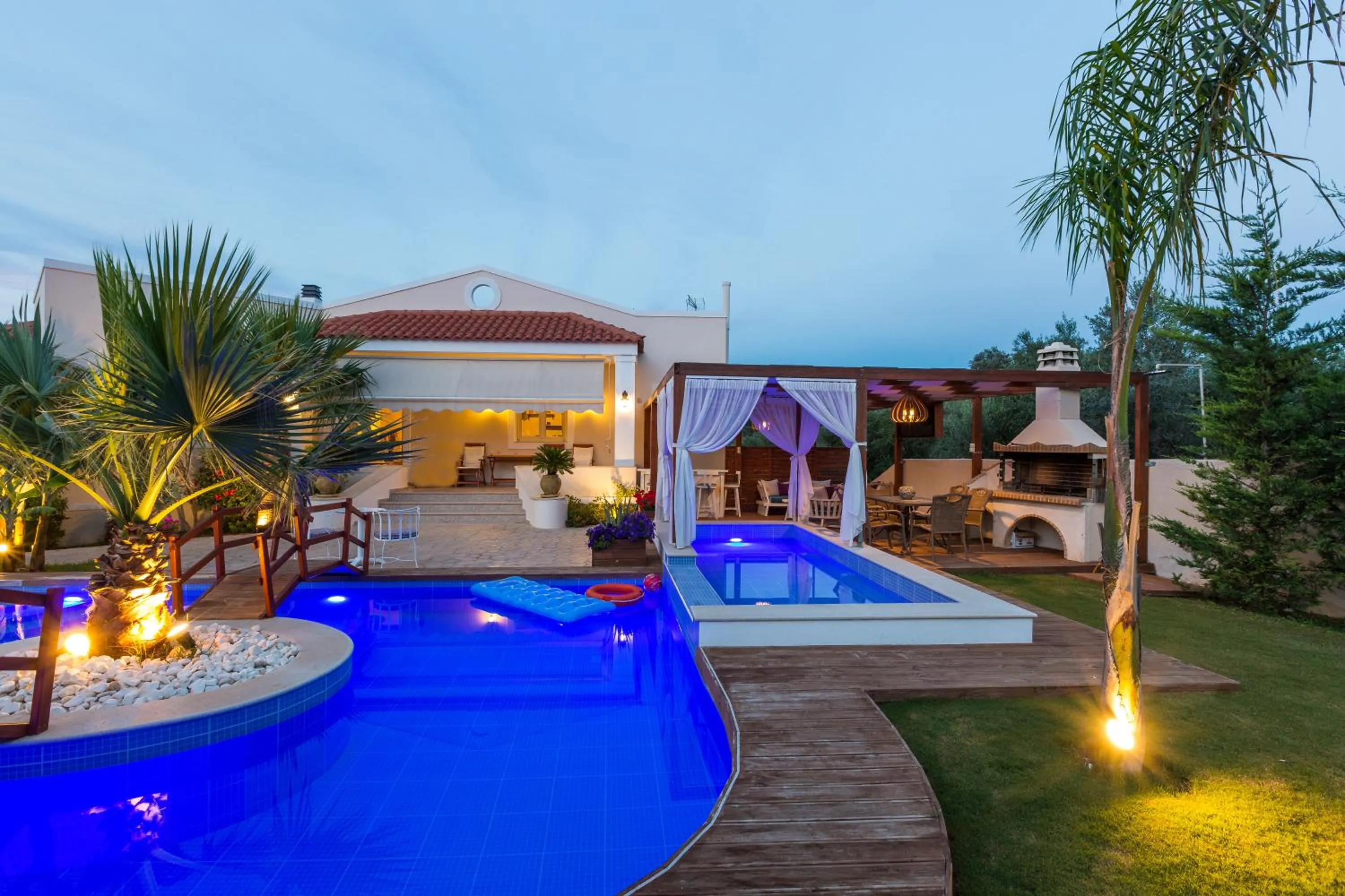 Property building in Eva & Dimitrios Villas, Captivating Oasis with Pools & BBQ, By ThinkVilla