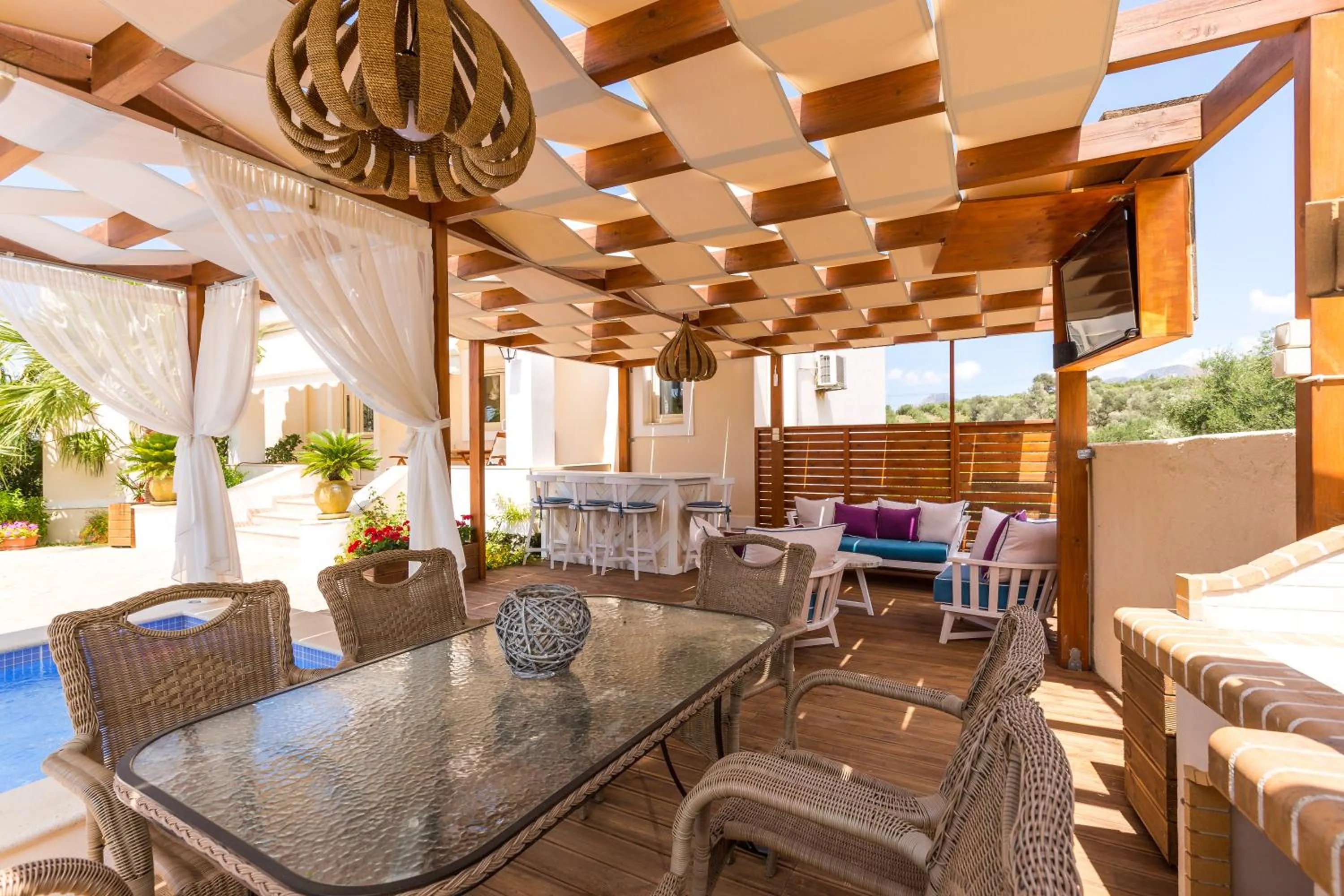 Patio in Eva & Dimitrios Villas, Captivating Oasis with Pools & BBQ, By ThinkVilla