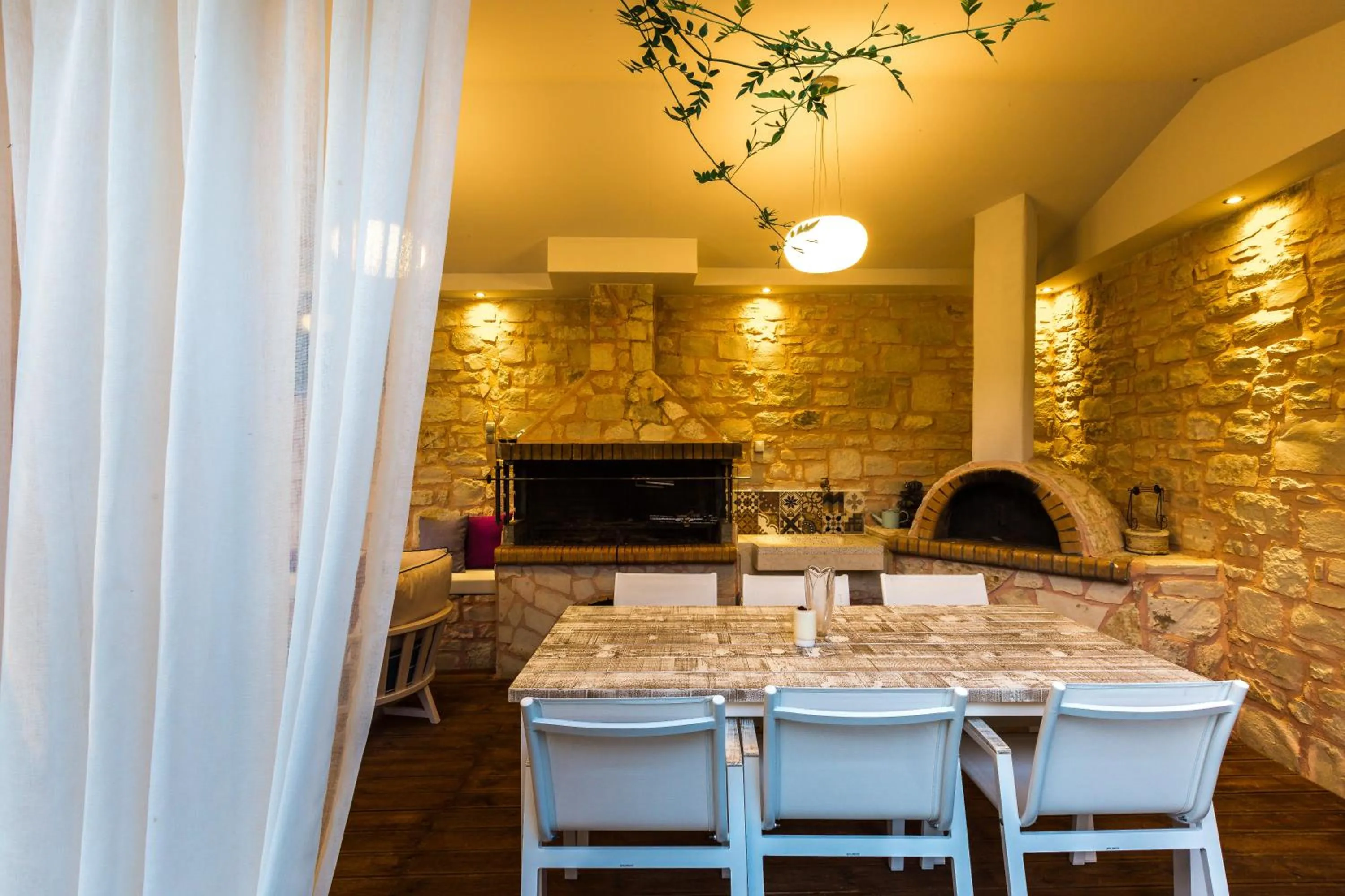 Dining area in Eva & Dimitrios Villas, Captivating Oasis with Pools & BBQ, By ThinkVilla
