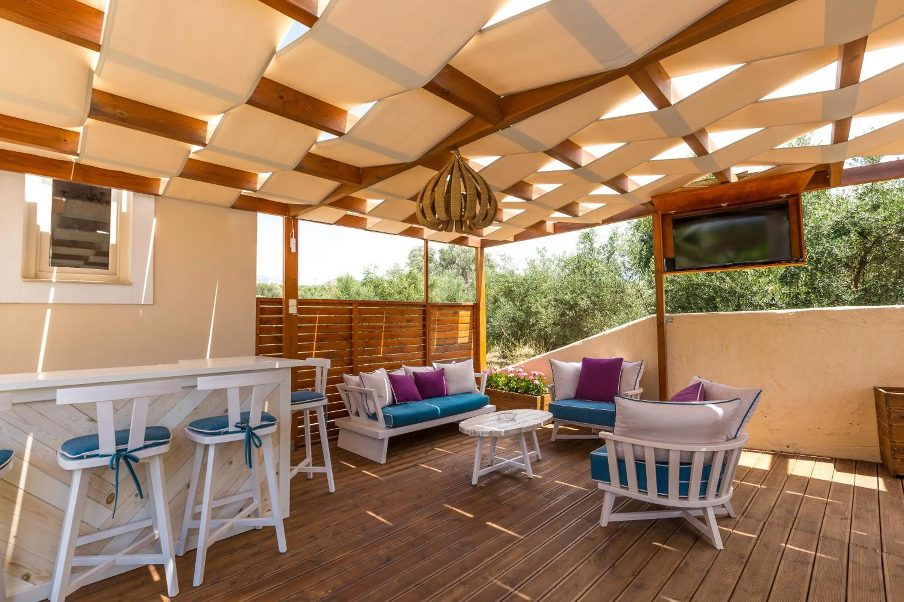 Patio in Eva & Dimitrios Villas, Captivating Oasis with Pools & BBQ, By ThinkVilla