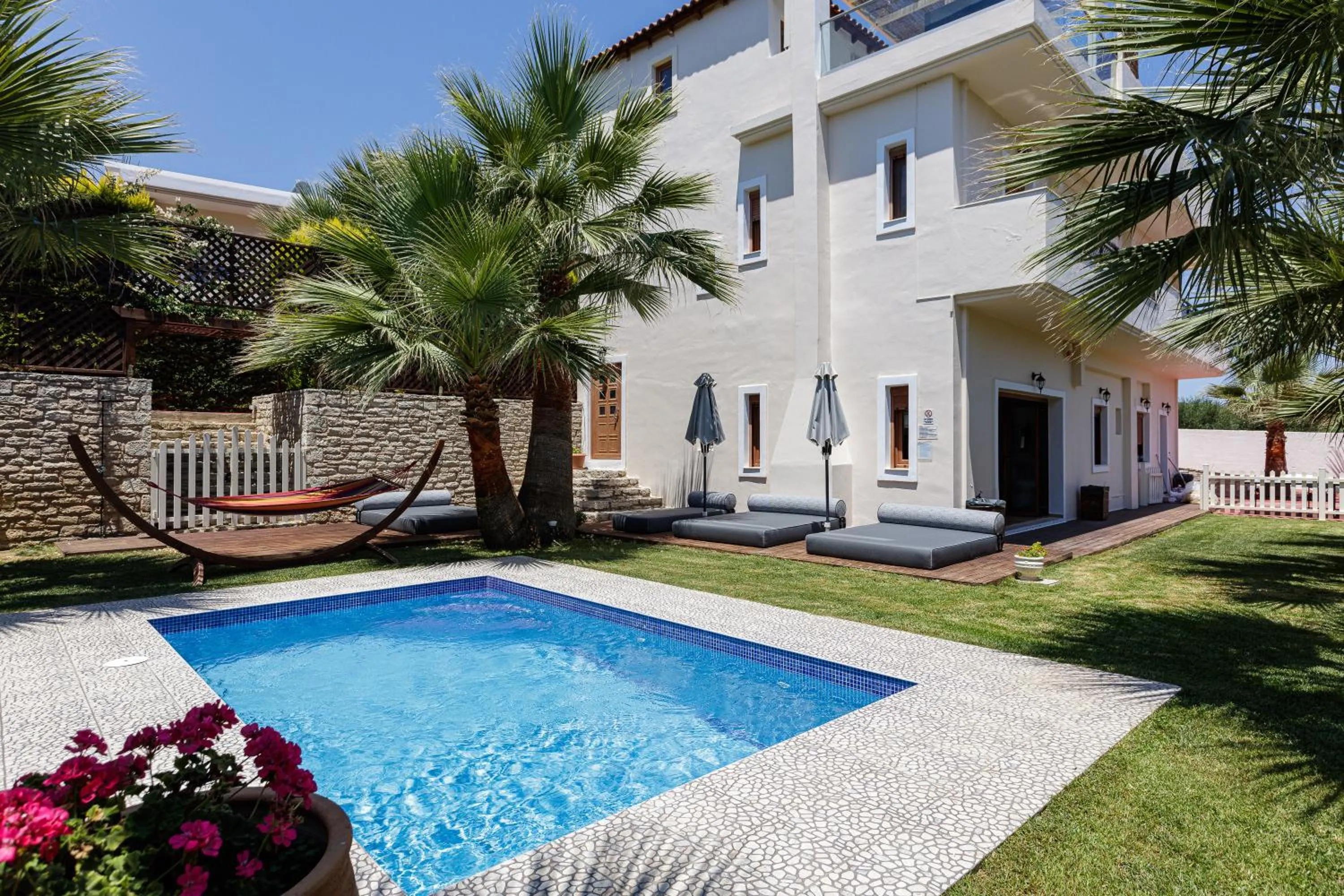 Swimming pool in Eva & Dimitrios Villas, Captivating Oasis with Pools & BBQ, By ThinkVilla