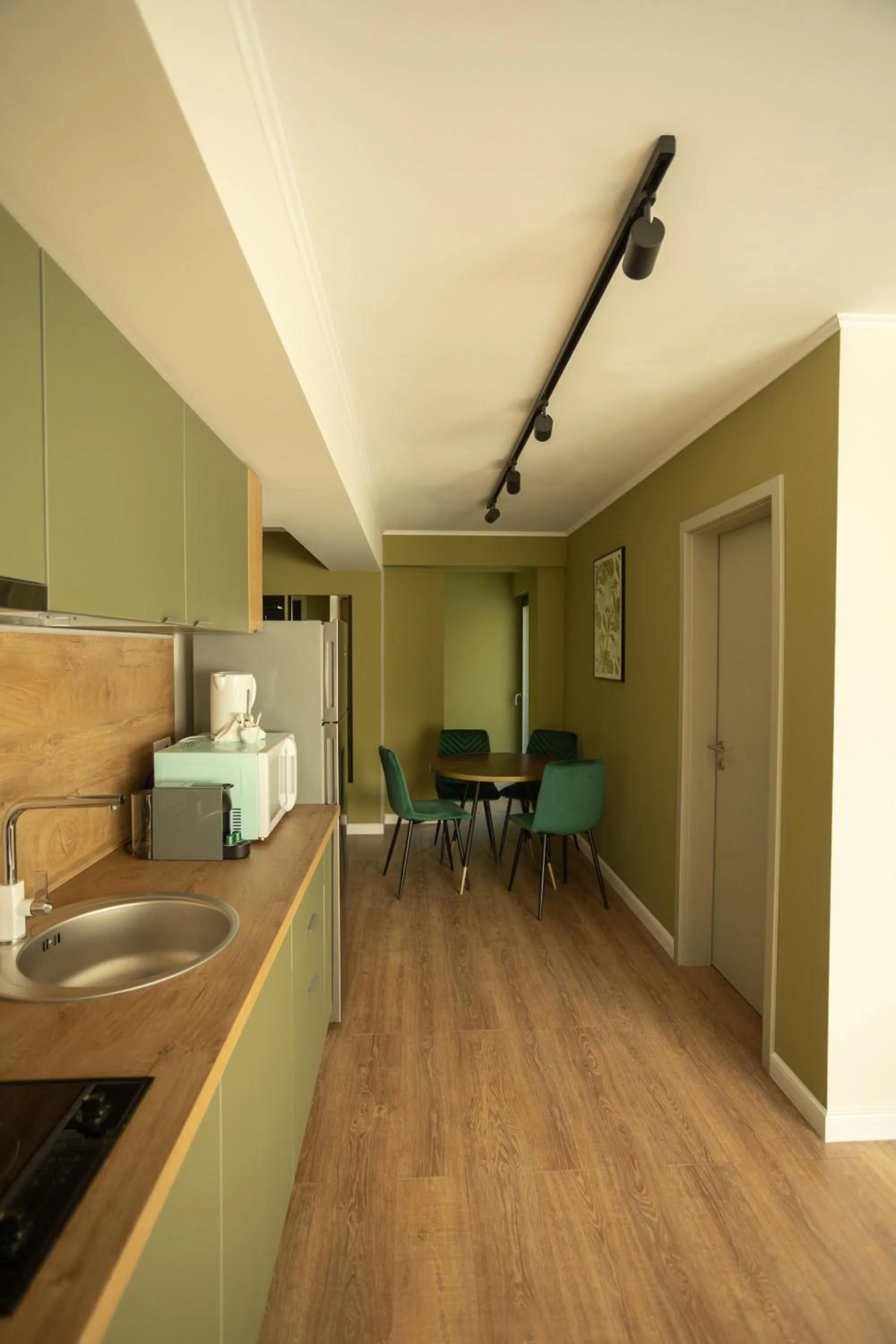 Kitchen or kitchenette in Oliv Residence