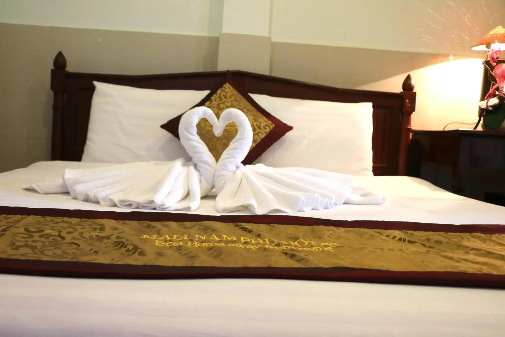 Bed in Mali Namphu Hotel Bed in Mali Namphu Hotel