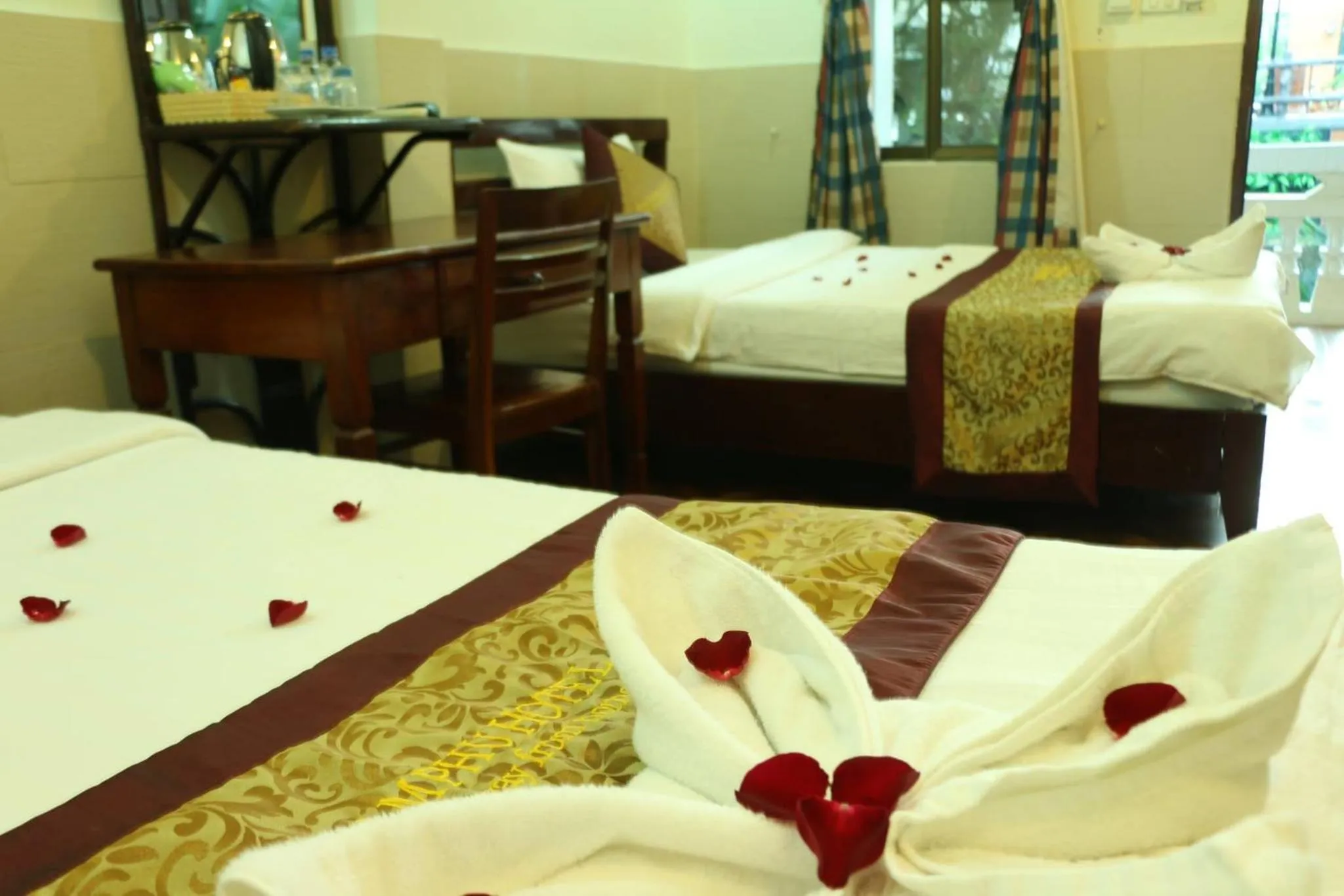 Bed in Mali Namphu Hotel