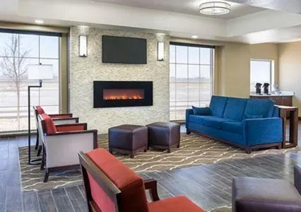 Communal lounge/ TV room in Comfort Inn Midland South I-20