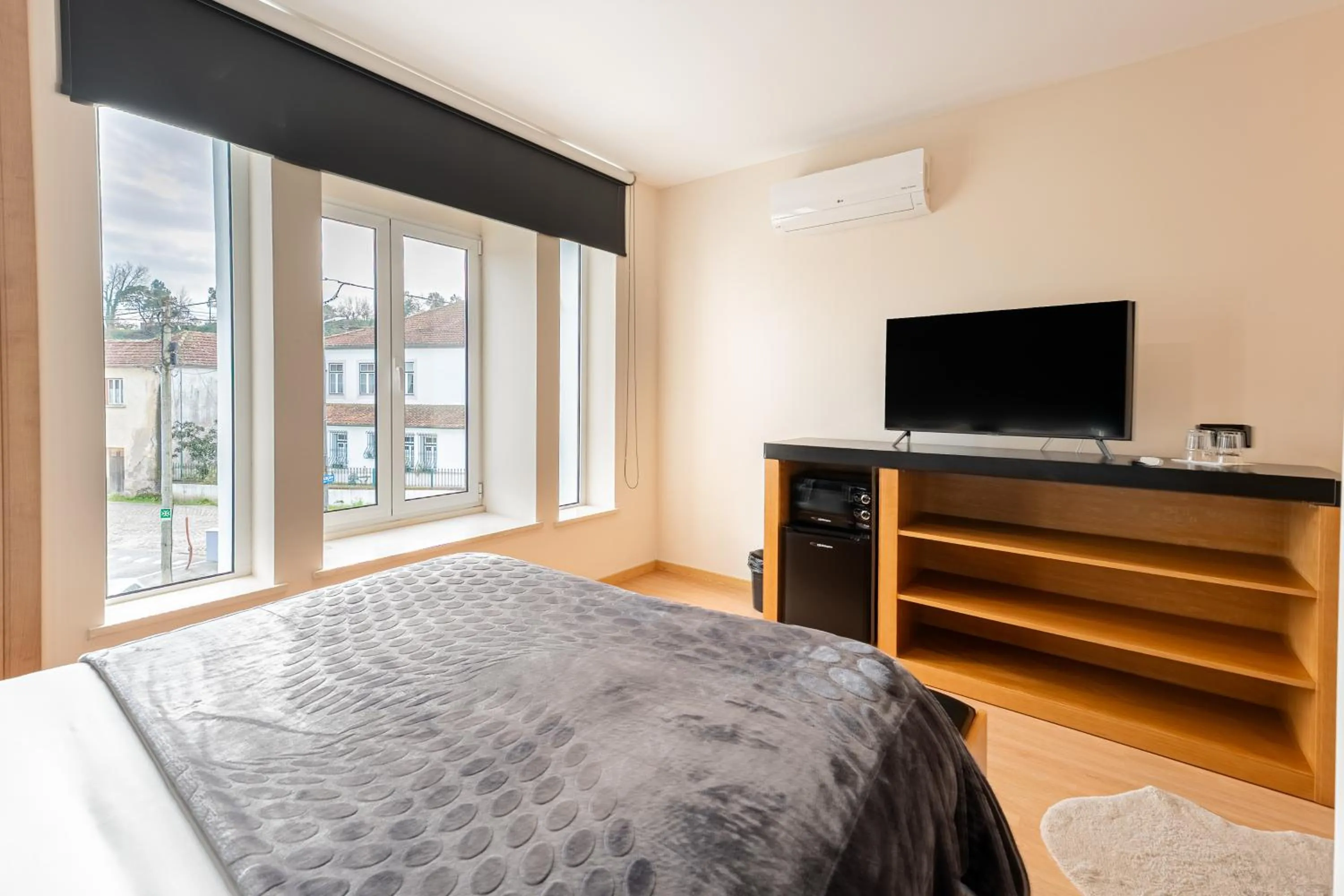 Communal lounge/ TV room, Bed in Lena Village Hotel and Spa