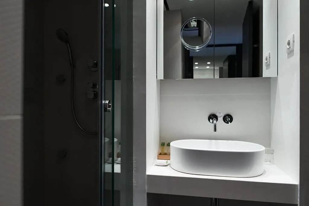 Shower in Alexandra Barcelona Hotel, Curio Collection by Hilton