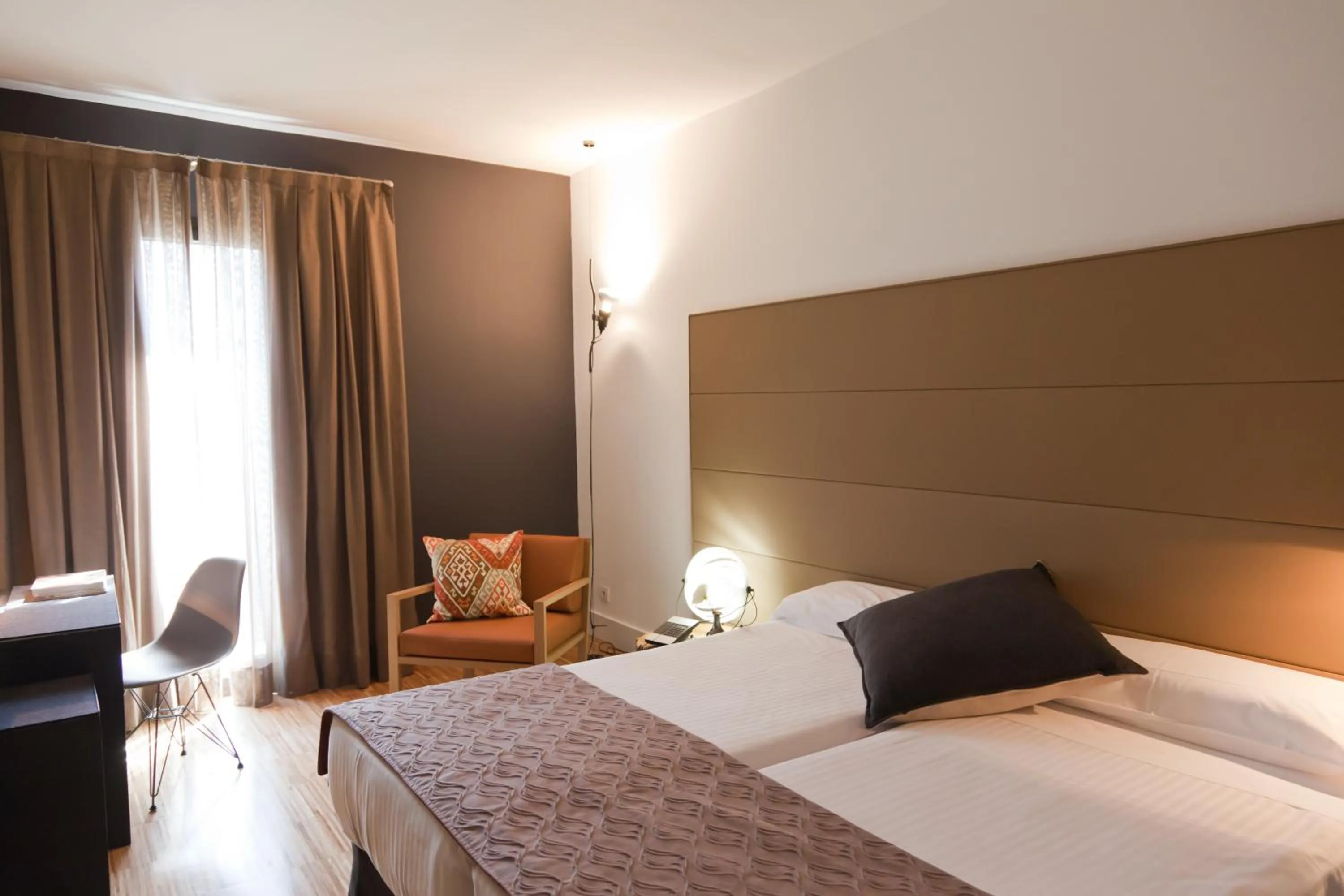 Bed in Alexandra Barcelona Hotel, Curio Collection by Hilton