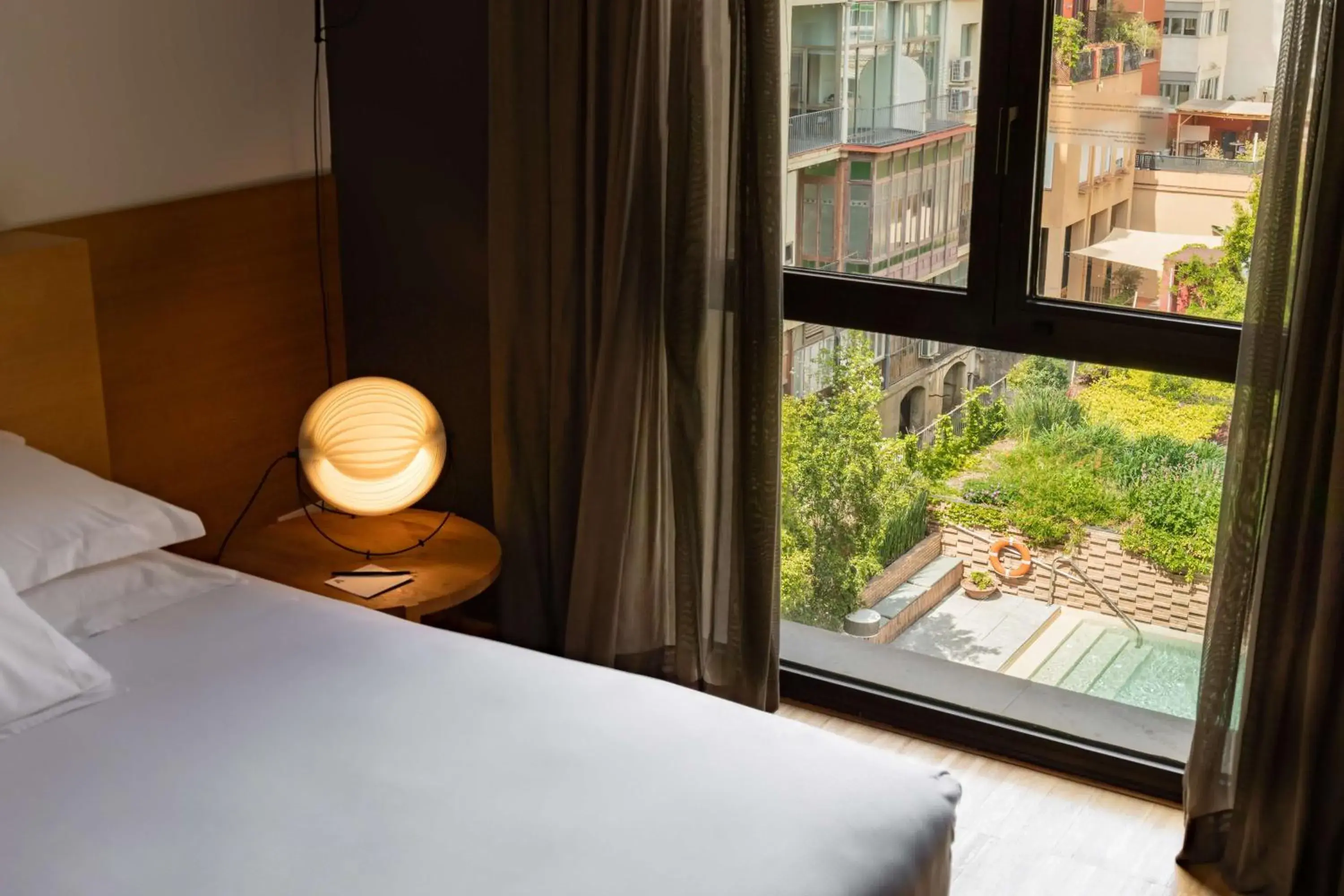 View (from property/room), Bed in Alexandra Barcelona Hotel, Curio Collection by Hilton View (from property/room), Bed in Alexandra Barcelona Hotel, Curio Collection by Hilton