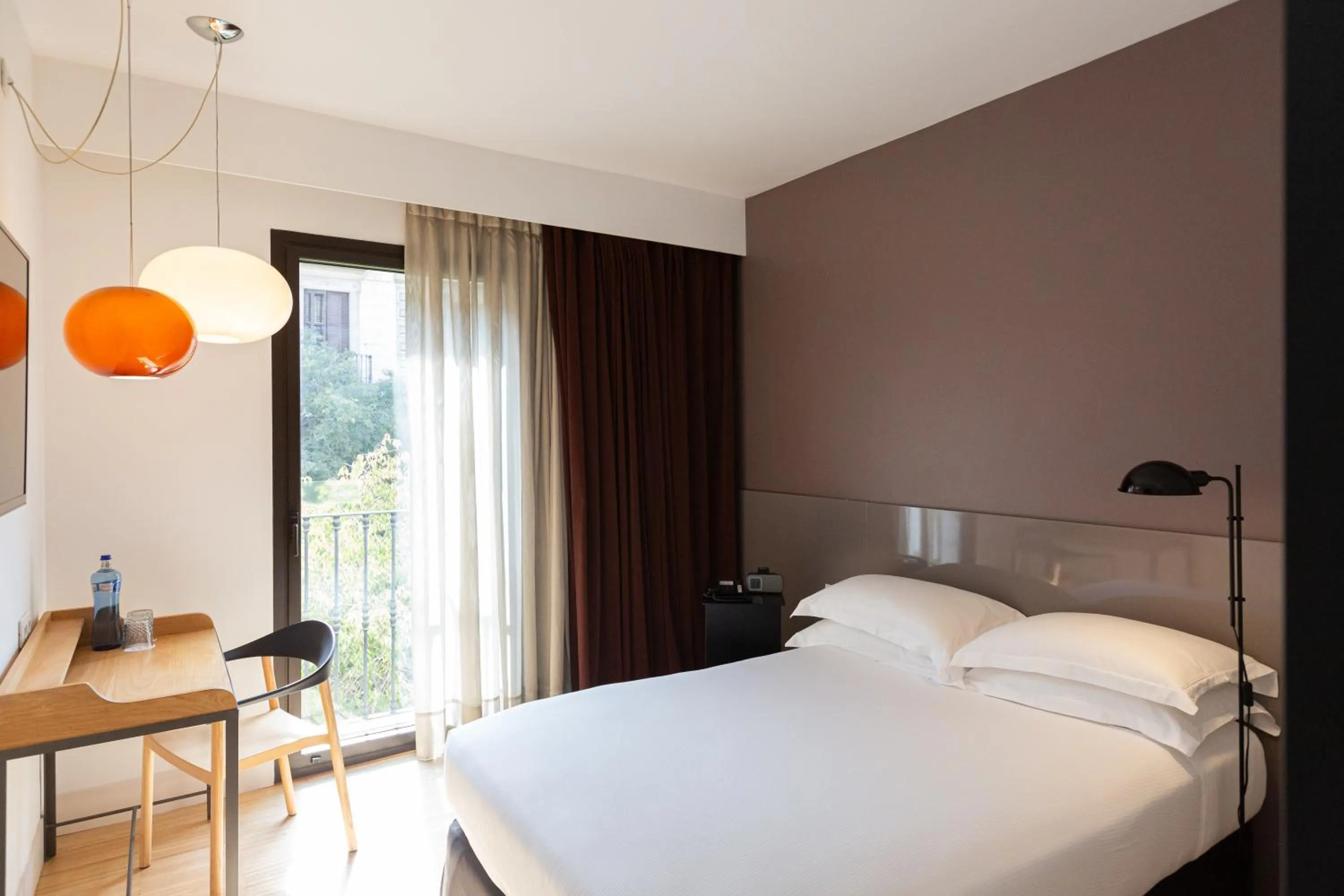Bed in Alexandra Barcelona Hotel, Curio Collection by Hilton