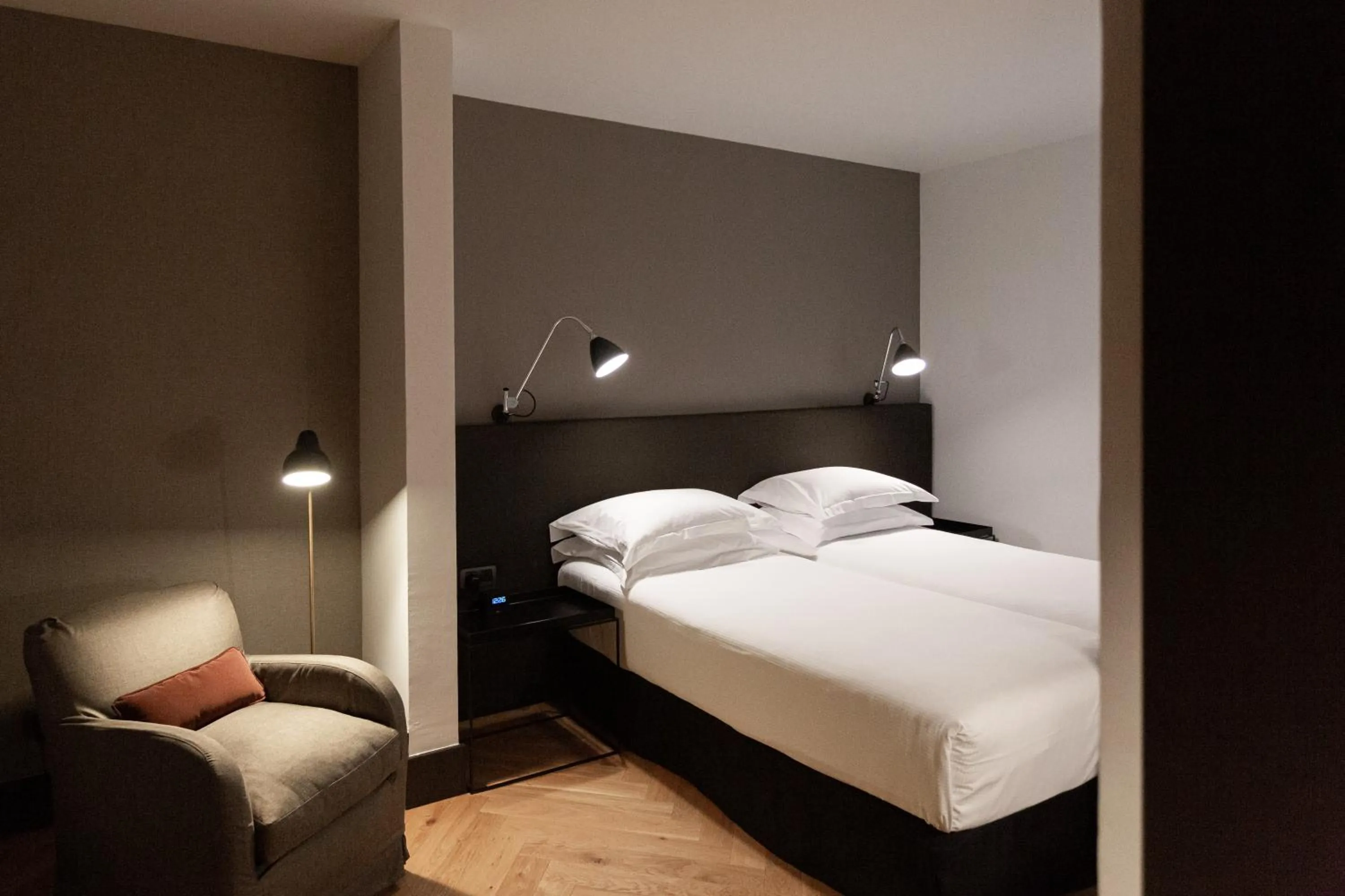 Bed in Alexandra Barcelona Hotel, Curio Collection by Hilton