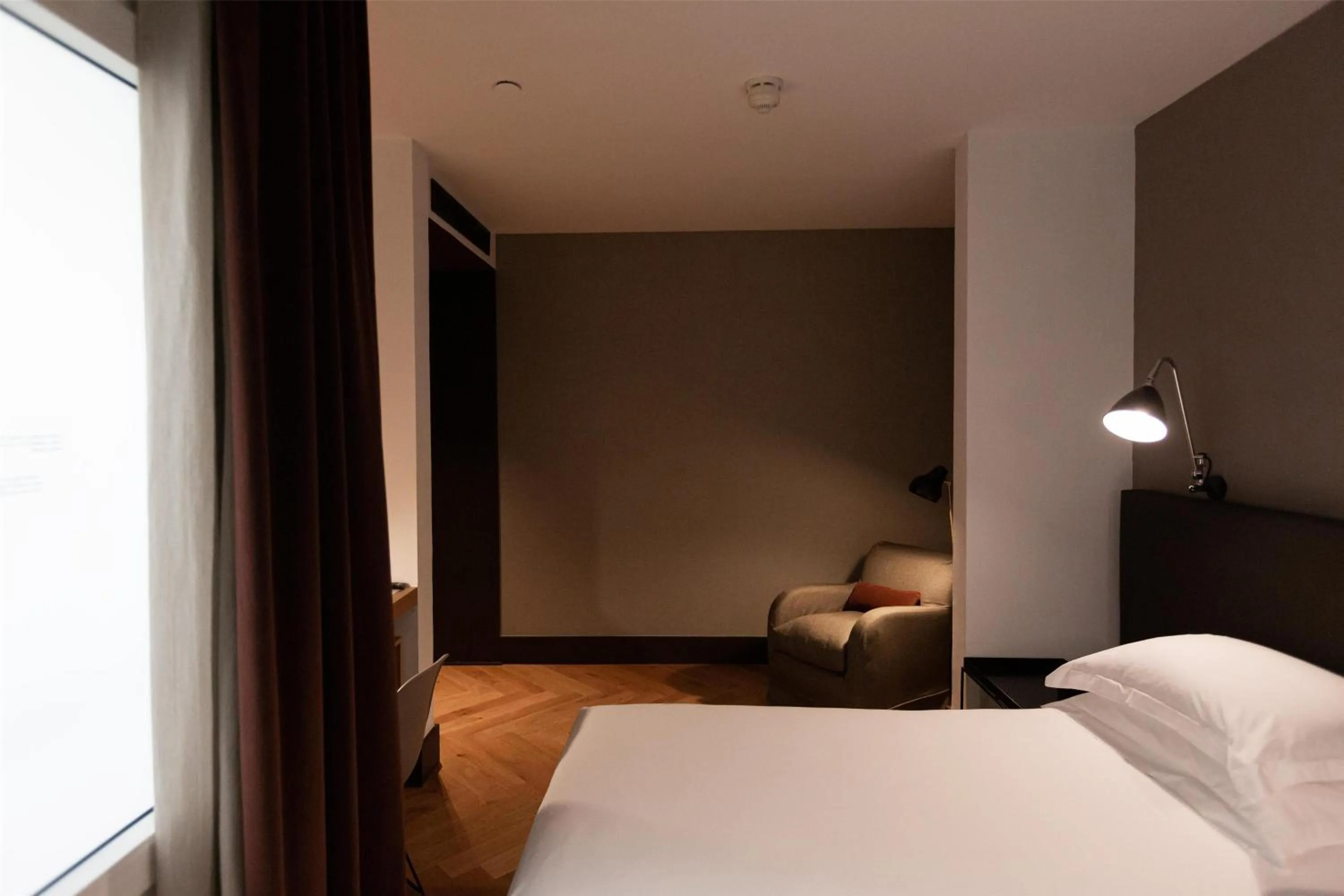 Bed in Alexandra Barcelona Hotel, Curio Collection by Hilton
